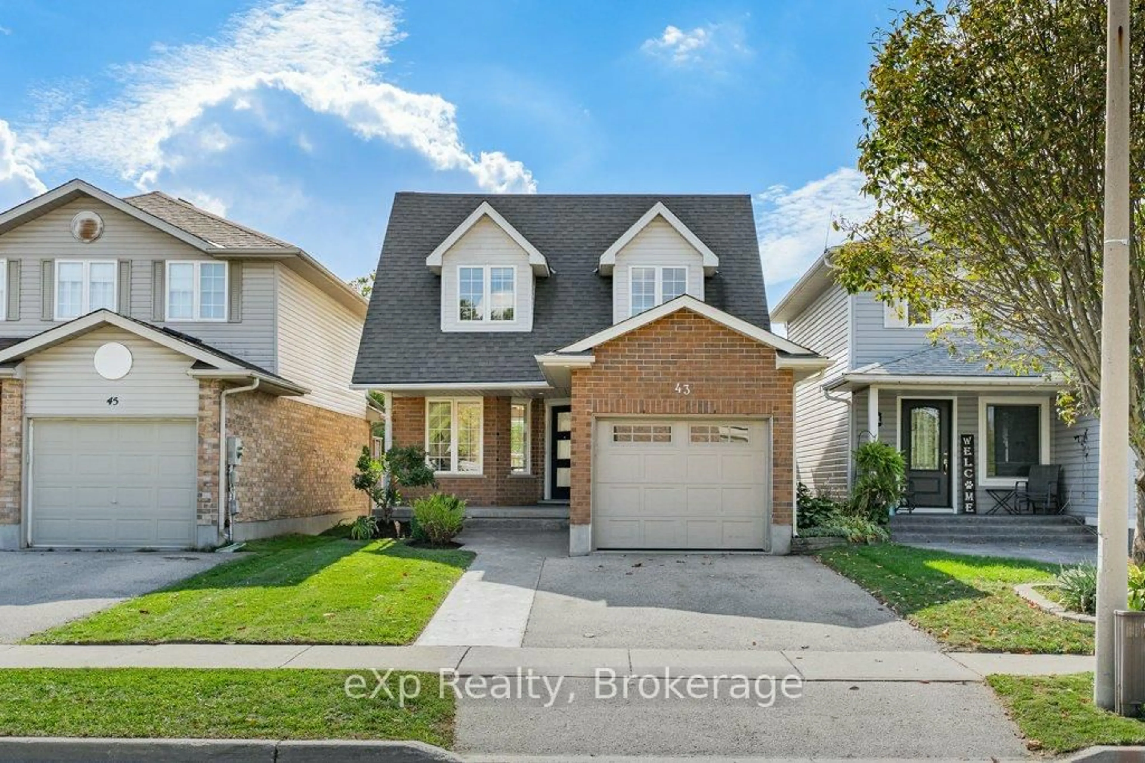 Home with brick exterior material, street for 43 Boulder Cres, Guelph Ontario N1G 5A2