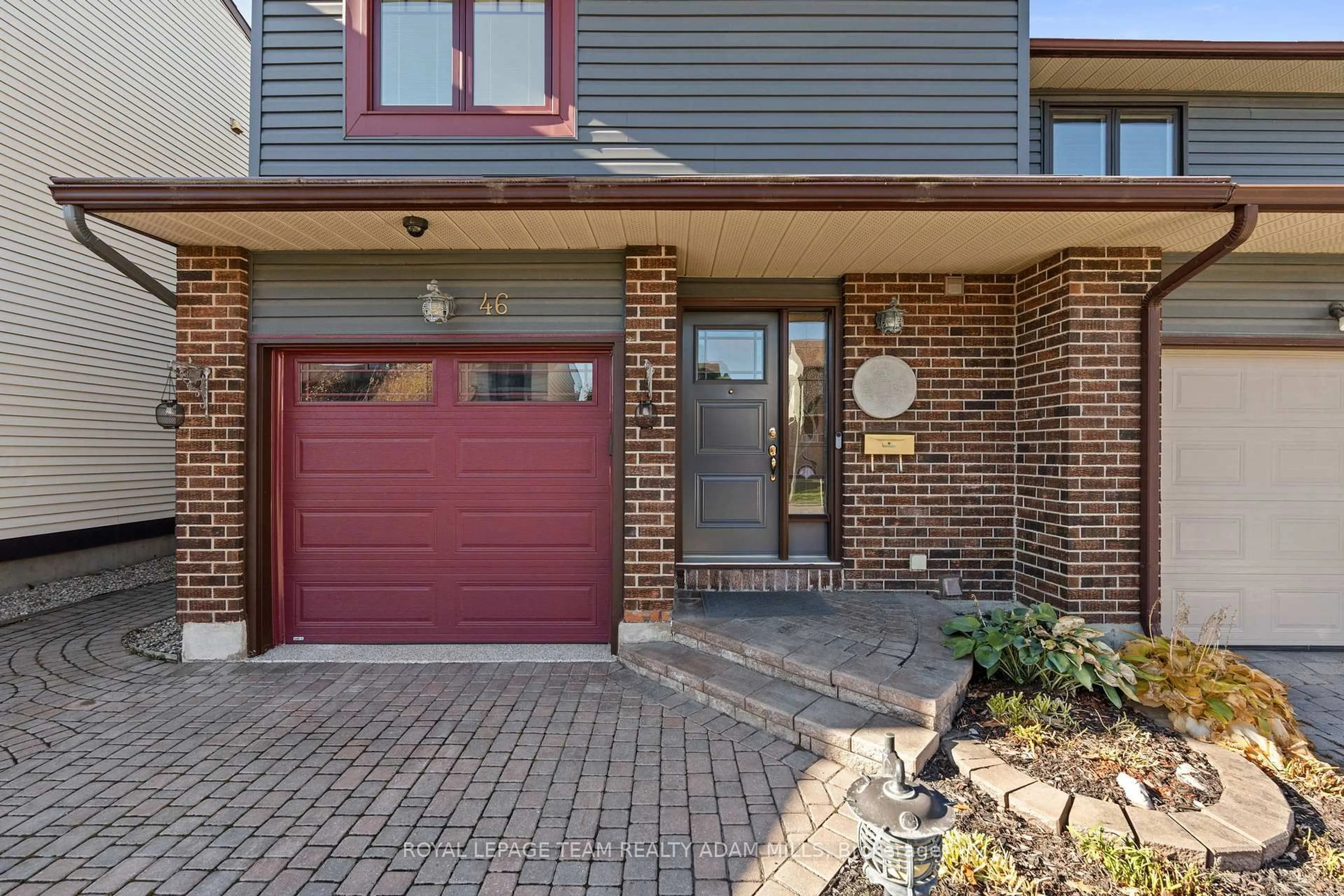 Home with brick exterior material, street for 46 Gentle Gate Cres, Ottawa Ontario K1T 1Z8