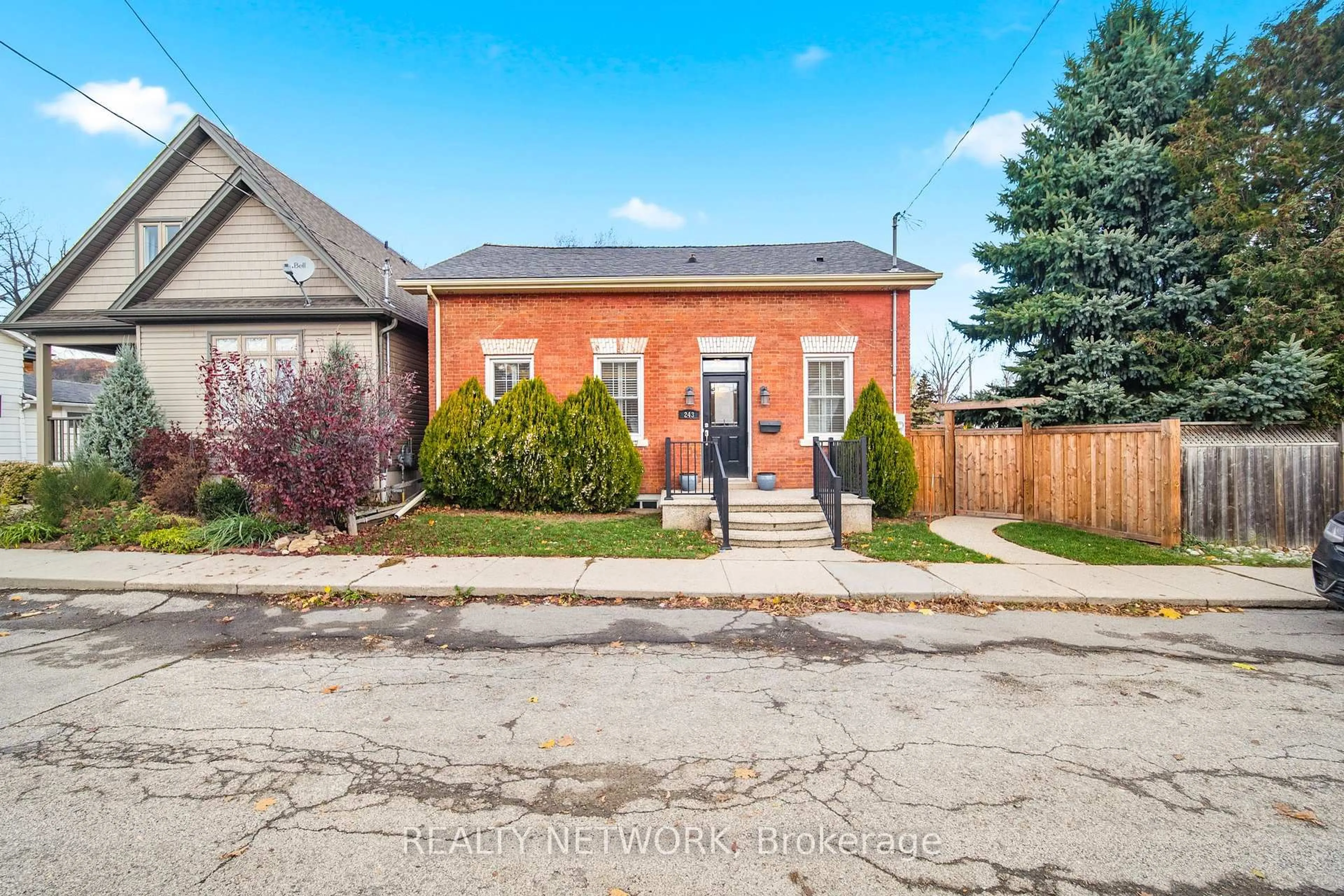 Home with brick exterior material, street for 243 Hatt St, Hamilton Ontario L9H 2H1