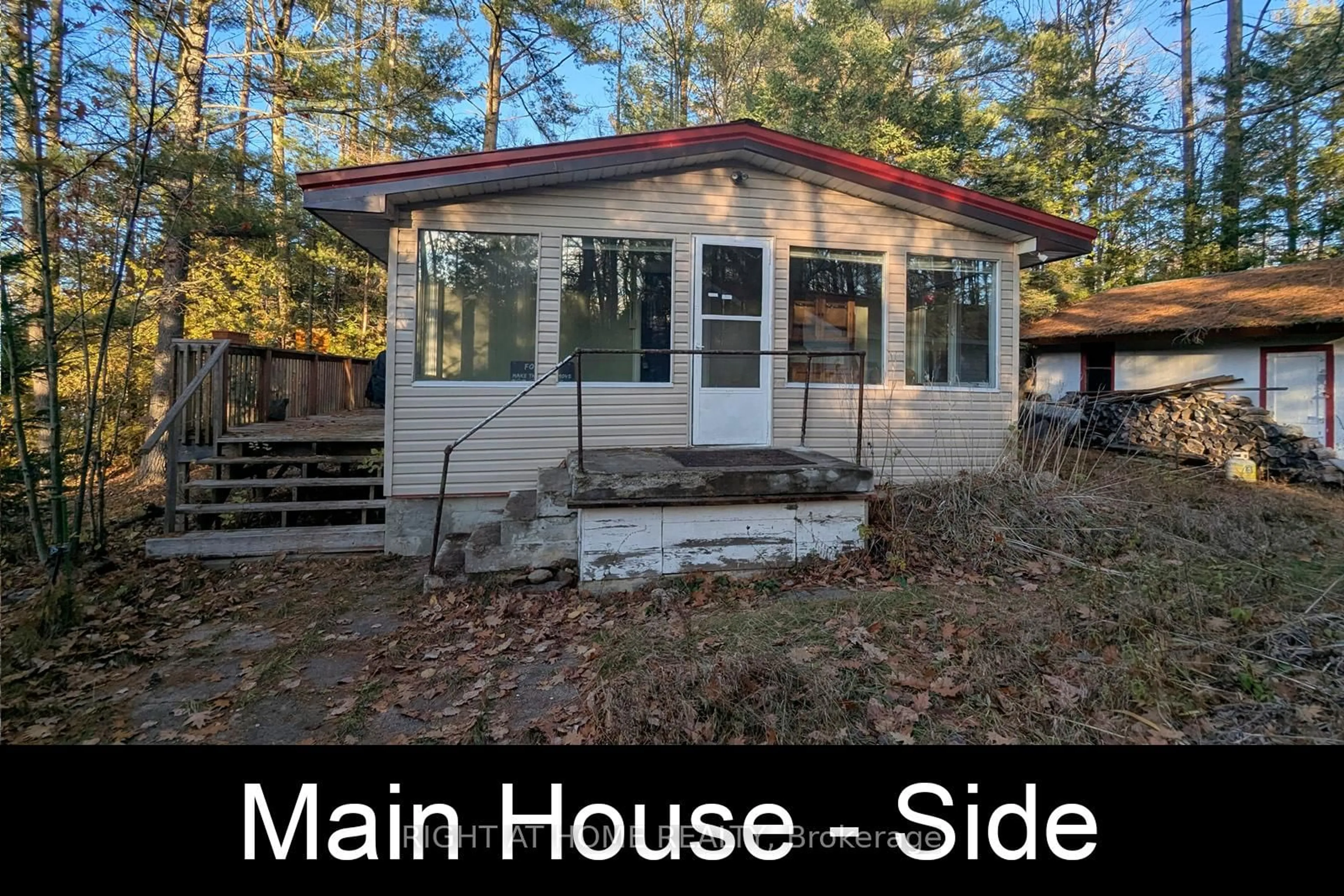 Home with vinyl exterior material, street for 2 Anne Dr, Trent Lakes Ontario K0M 2A0