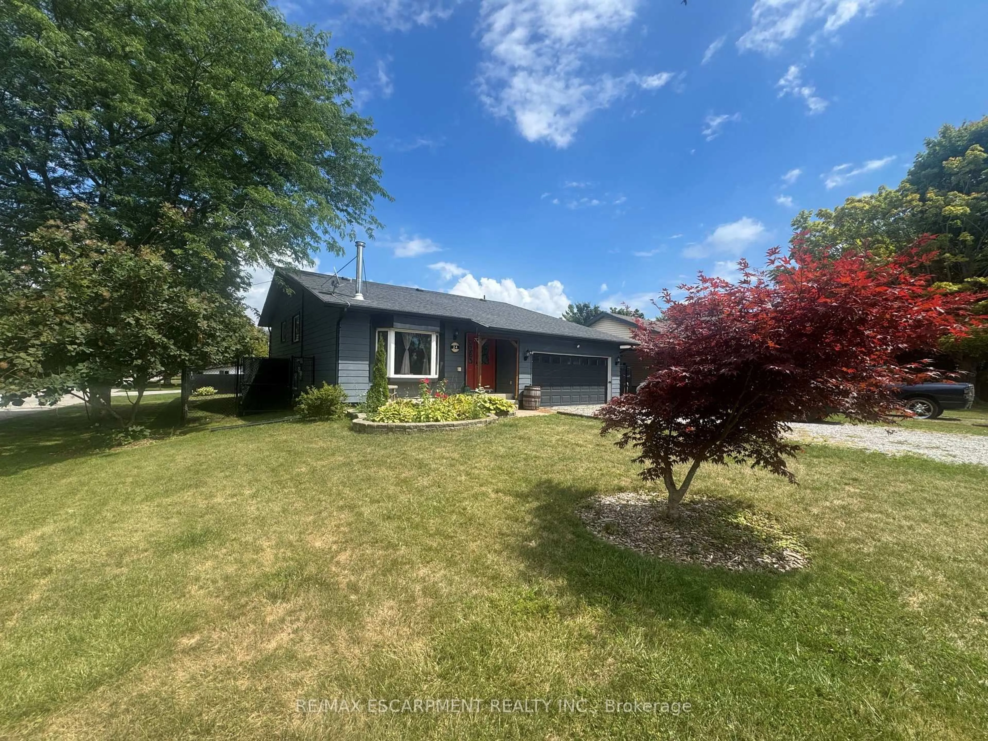 A pic from outside/outdoor area/front of a property/back of a property/a pic from drone, street for 24 Woodhouse Ave, Norfolk Ontario N0A 1N8