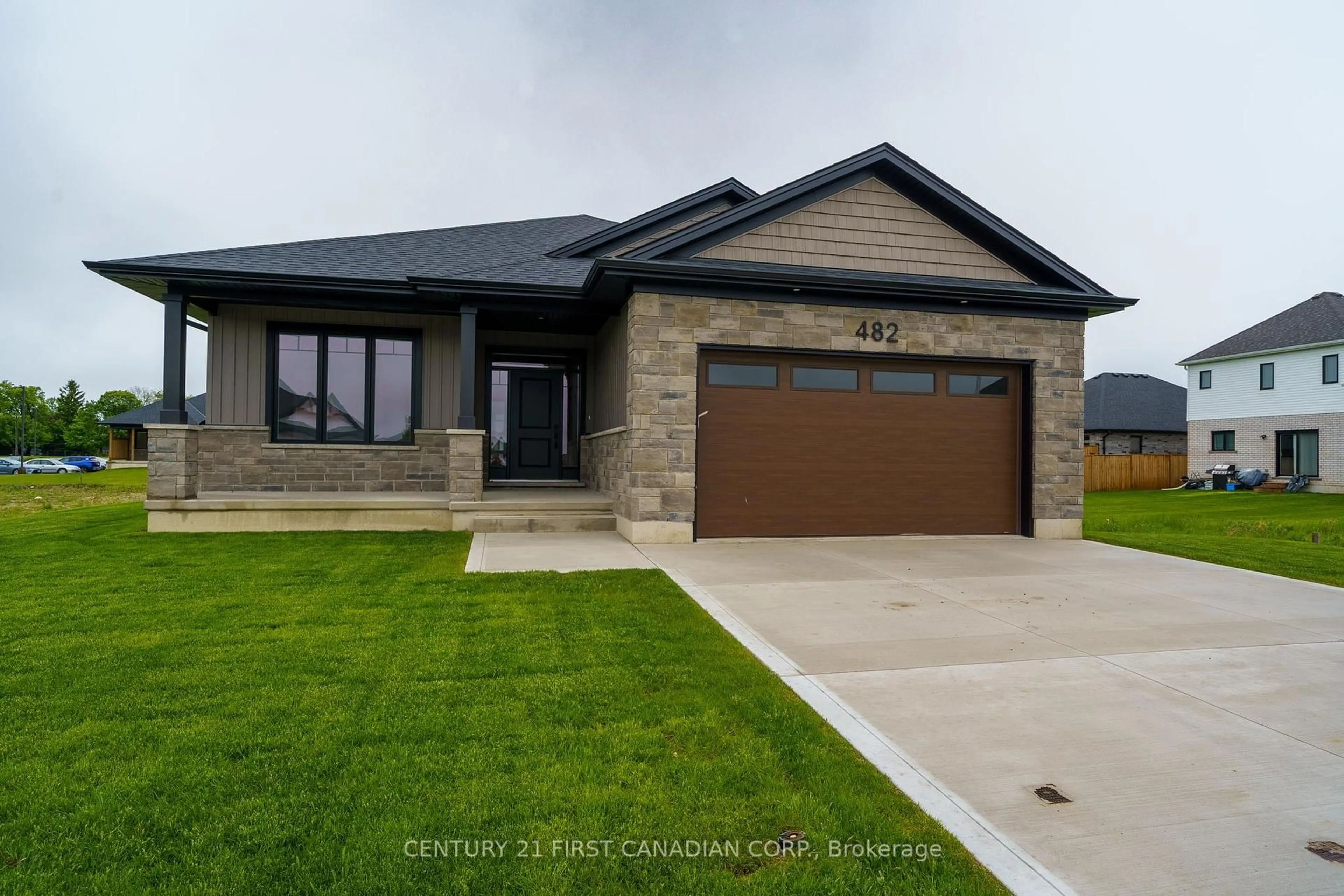 Home with brick exterior material, street for 60 Greene St, South Huron Ontario N0M 1S3