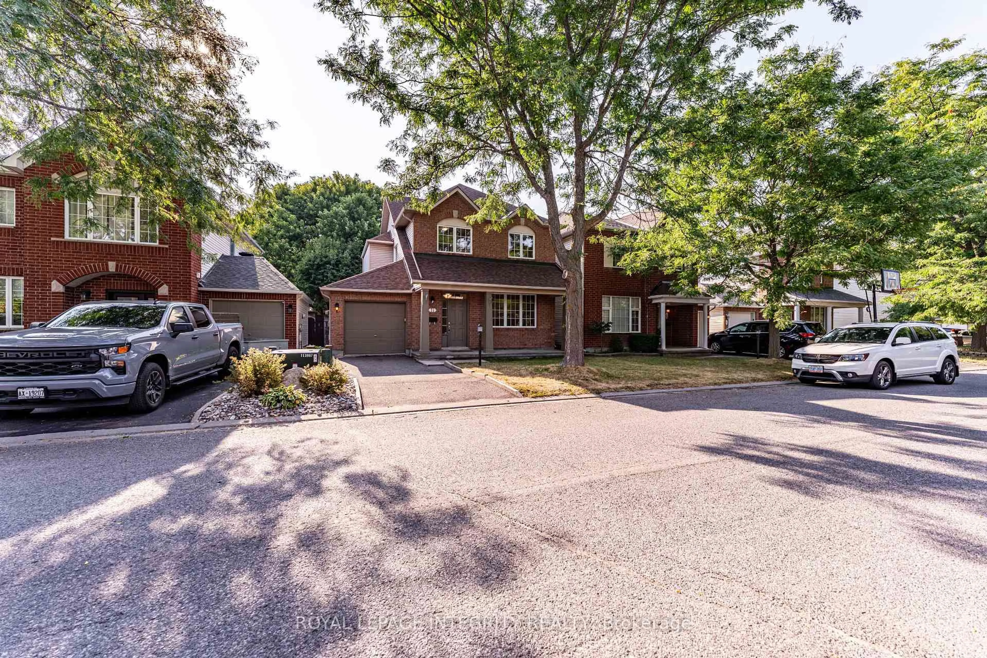 Home with brick exterior material, street for 71 Appledale Dr, Ottawa Ontario K2J 4W6