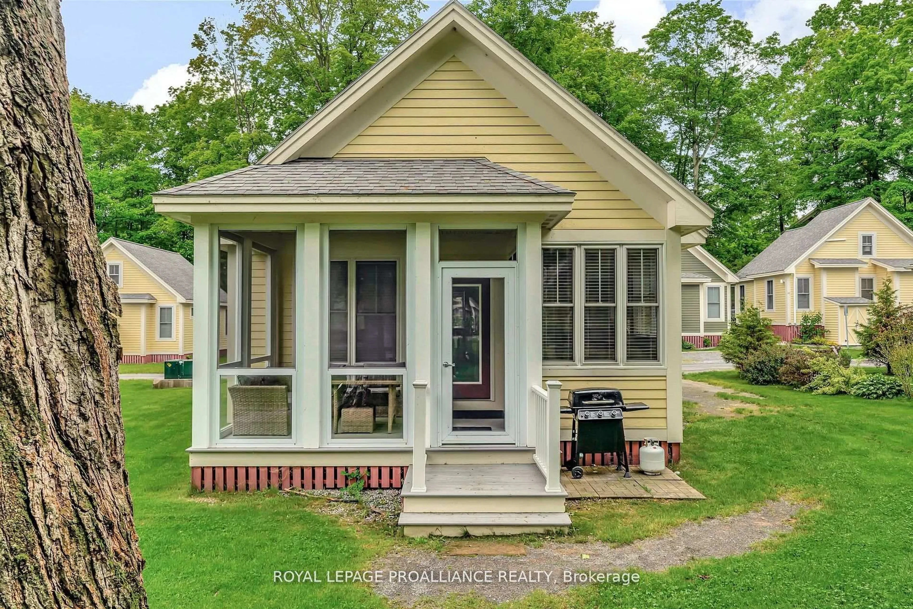 Home with vinyl exterior material, street for 9 Hollow Lane, Prince Edward County Ontario K0K 1P0