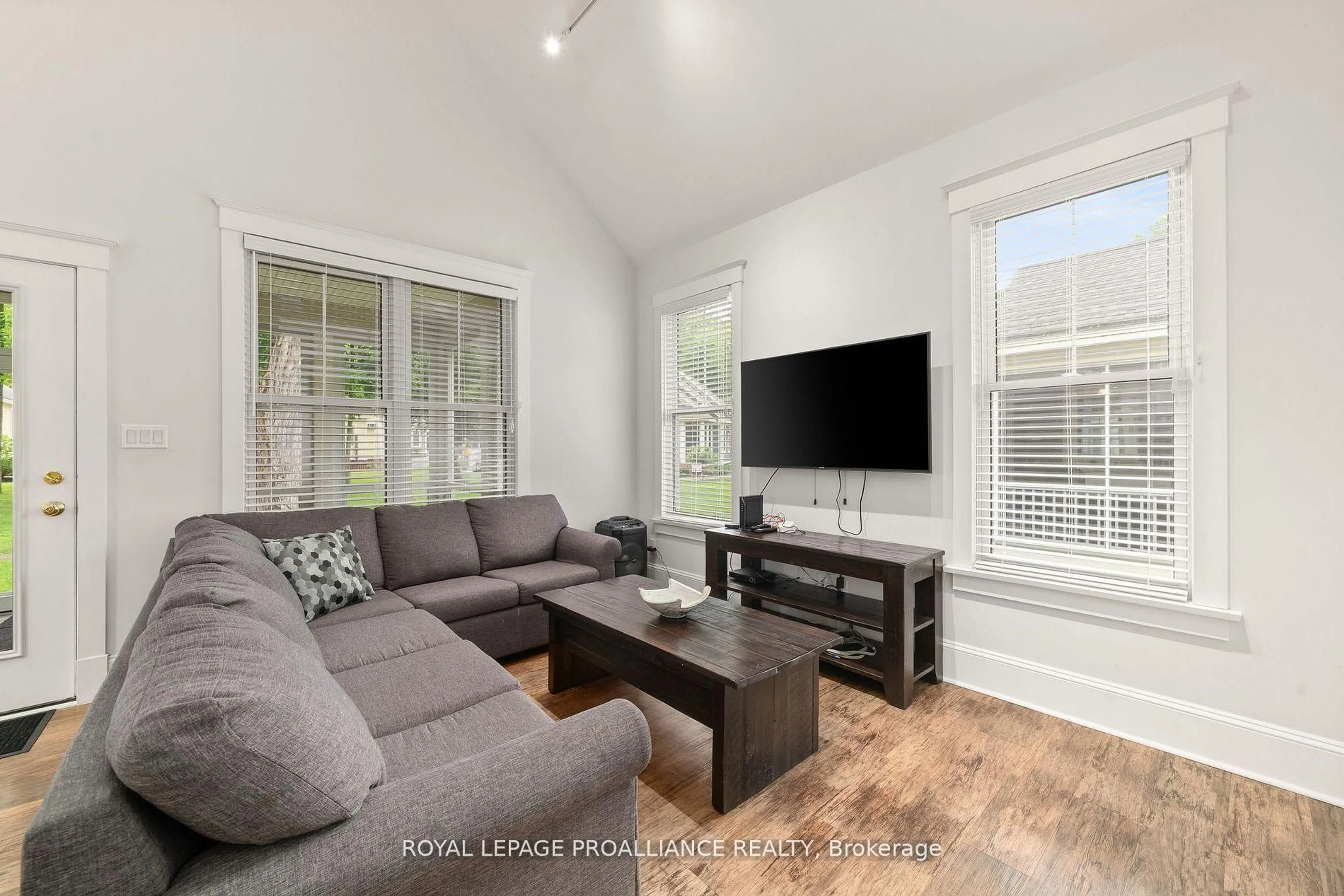 Living room with furniture, wood/laminate floor for 9 Hollow Lane, Prince Edward County Ontario K0K 1P0