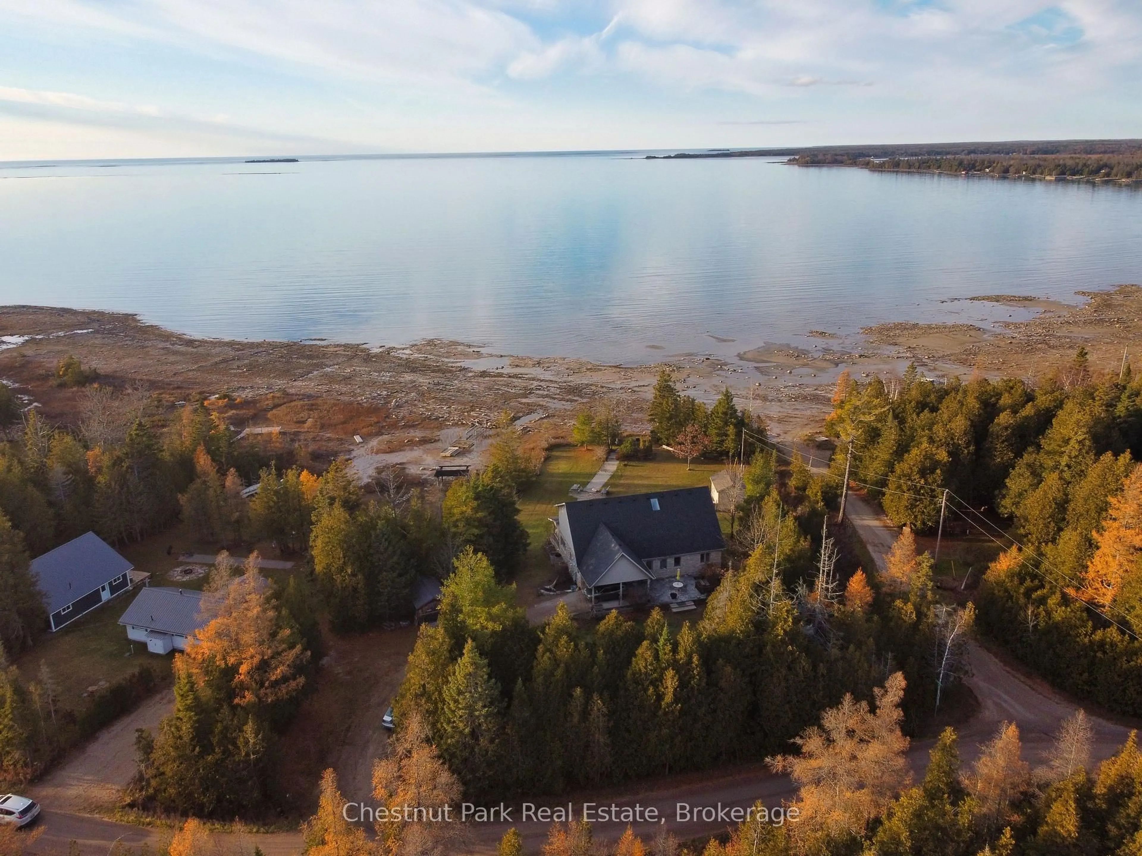 A pic from outside/outdoor area/front of a property/back of a property/a pic from drone, water/lake/river/ocean view for 36 Cedar Dr, South Bruce Peninsula Ontario N0H 1X0