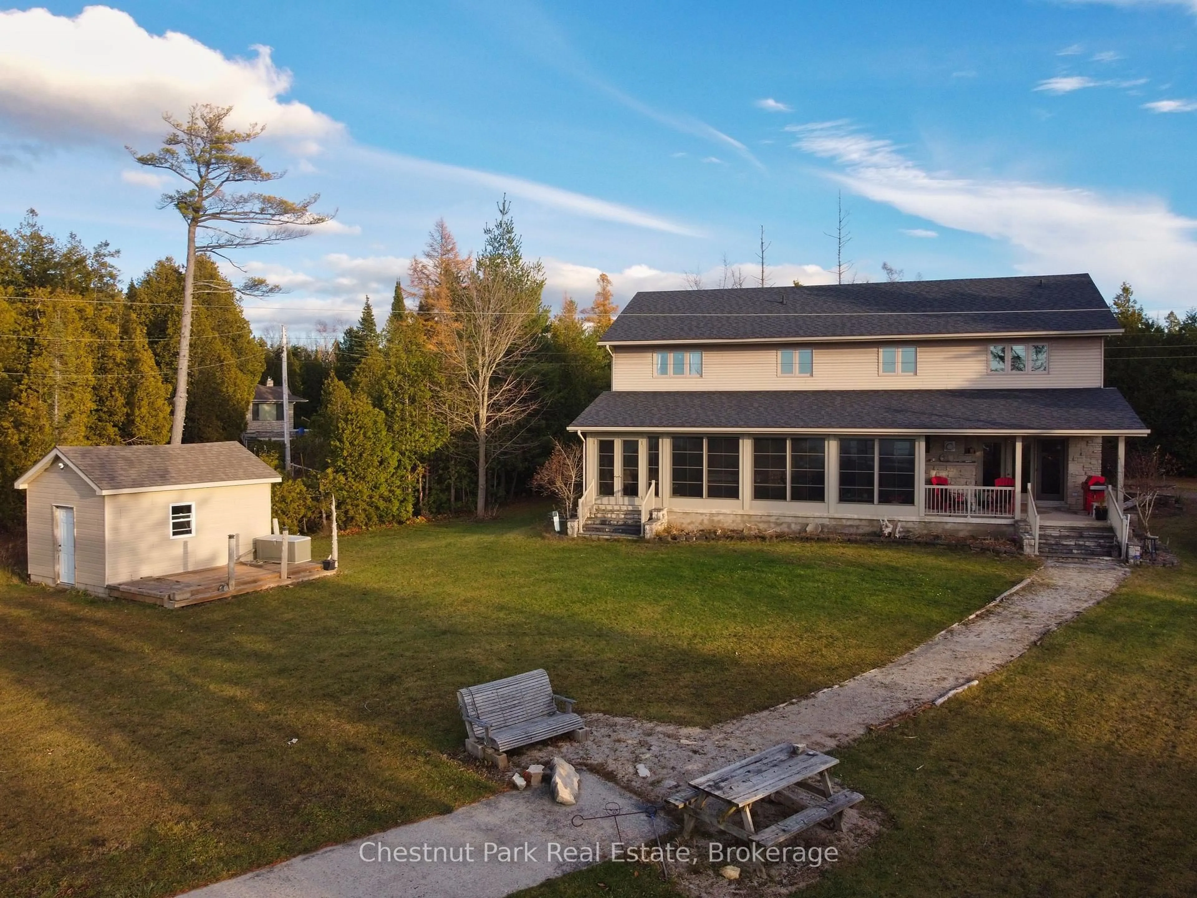 A pic from outside/outdoor area/front of a property/back of a property/a pic from drone, unknown for 36 Cedar Dr, South Bruce Peninsula Ontario N0H 1X0