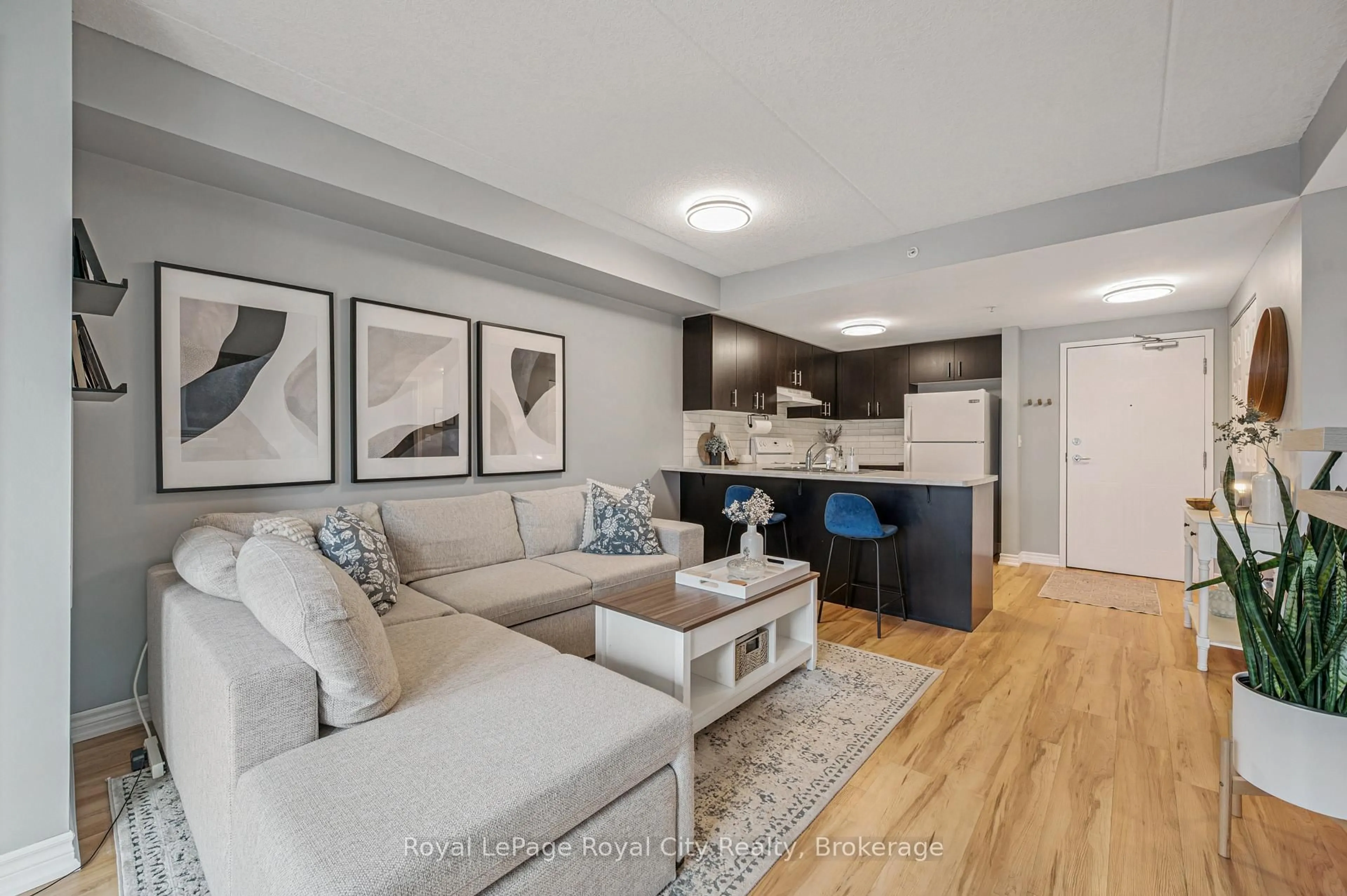 Living room with furniture, unknown for 41 Goodwin Dr #309, Guelph Ontario N1L 0E7