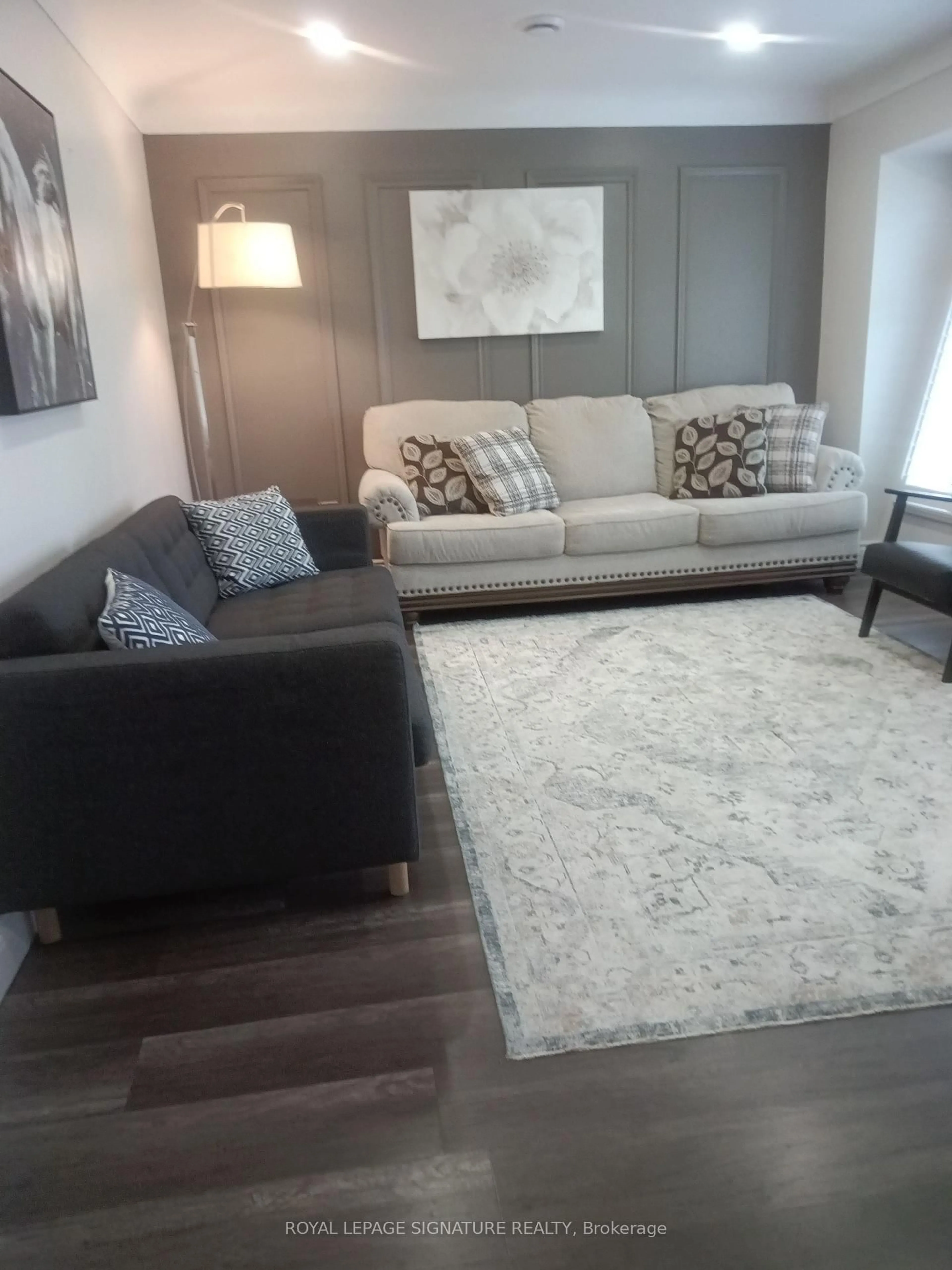 Living room with furniture, carpet floor for 98 Jacobson Ave, St. Catharines Ontario L2T 3A3