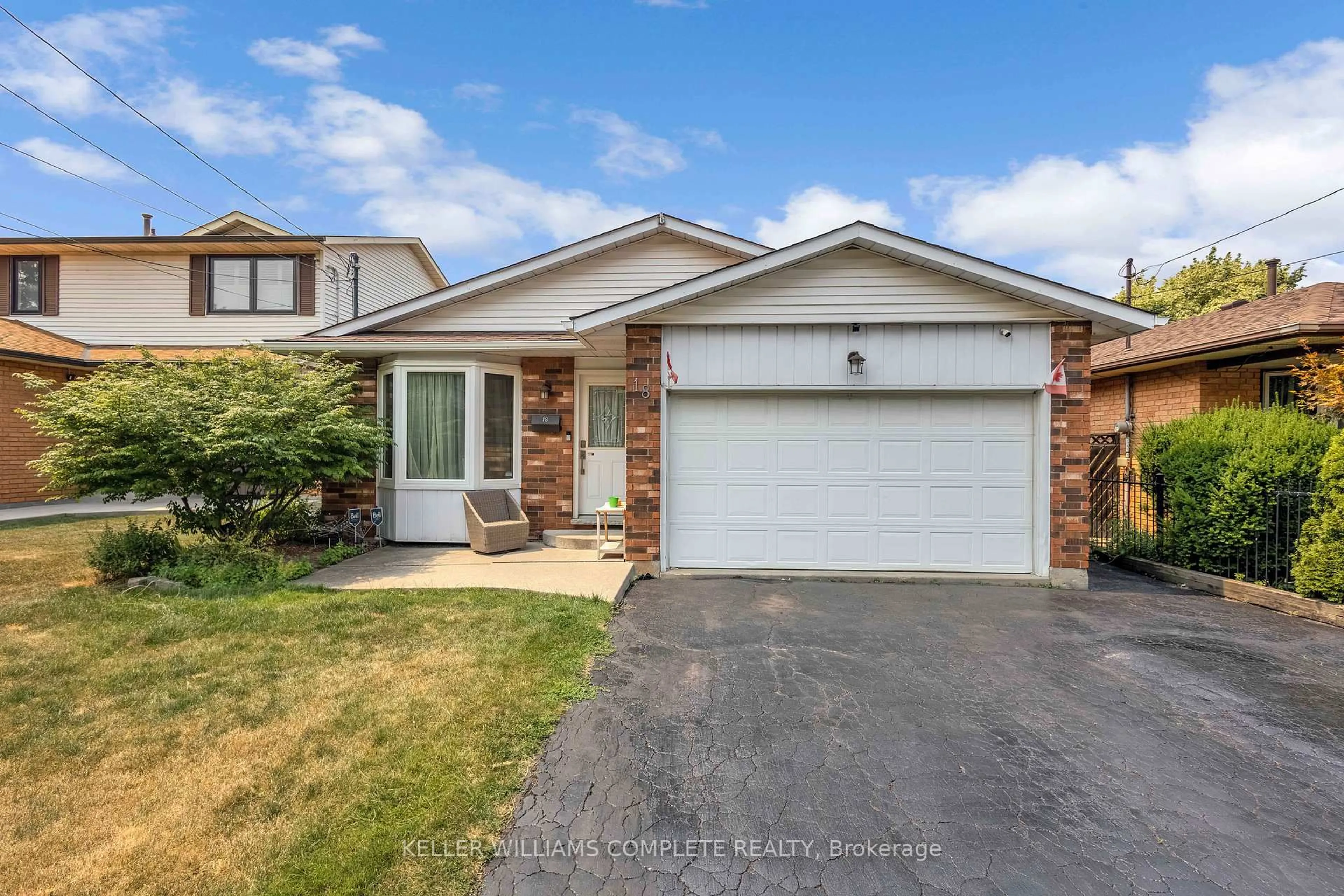 Home with brick exterior material, street for 18 Rosewell St, Hamilton Ontario L8W 2L1