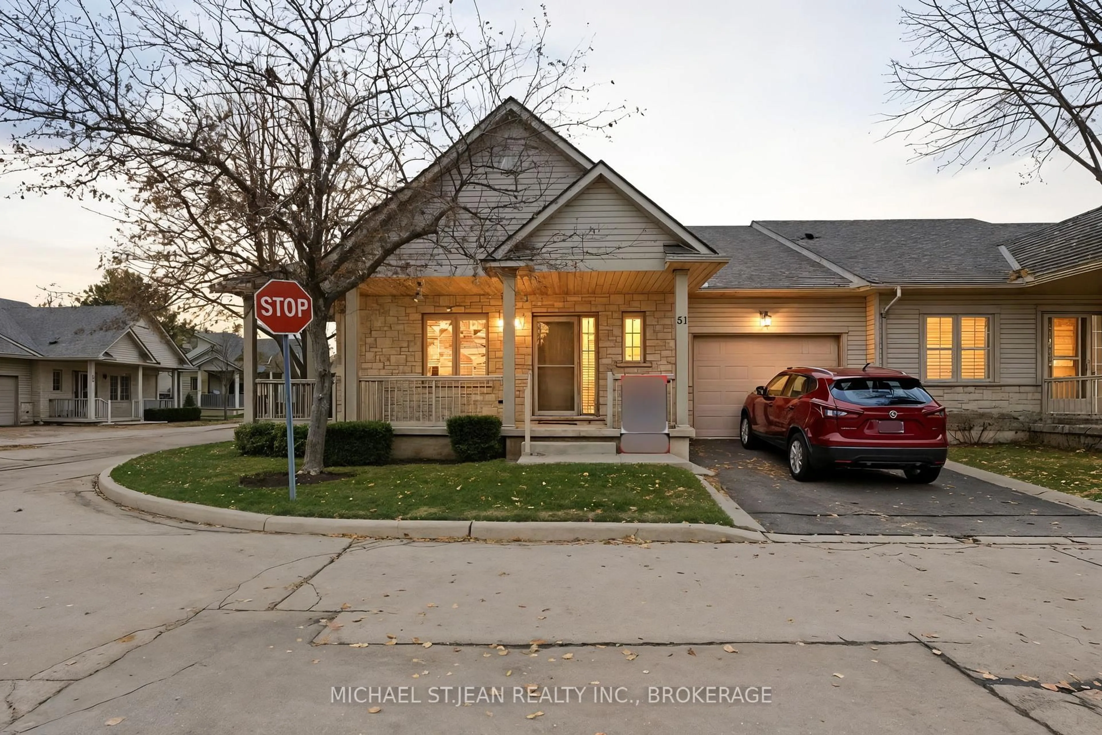 Home with brick exterior material, street for 34 Southbrook Dr #51, Hamilton Ontario L0R 1C0