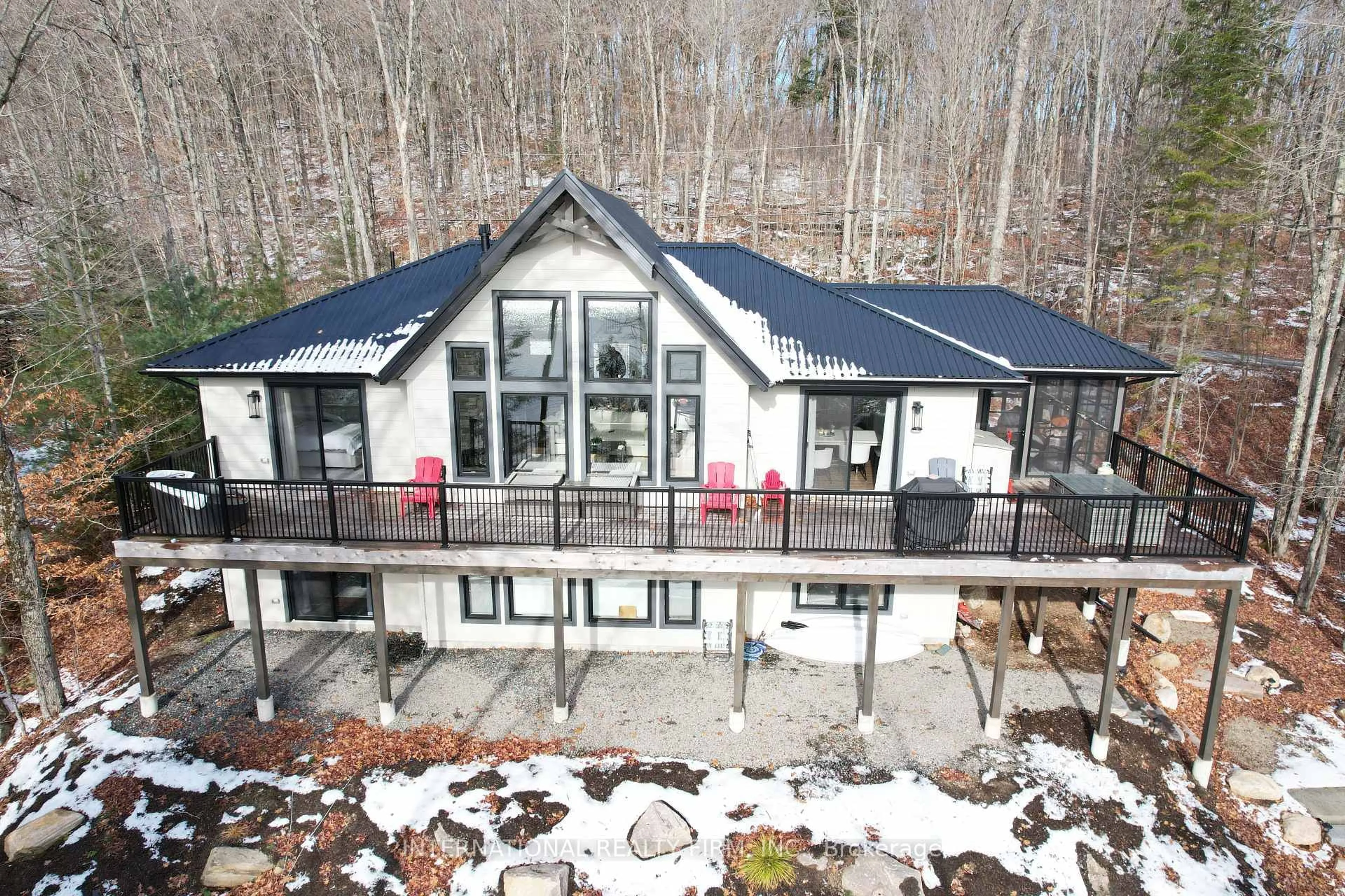 A pic from outside/outdoor area/front of a property/back of a property/a pic from drone, mountain view for 1073 Watson Rd, Lake of Bays Ontario P0B 0A3