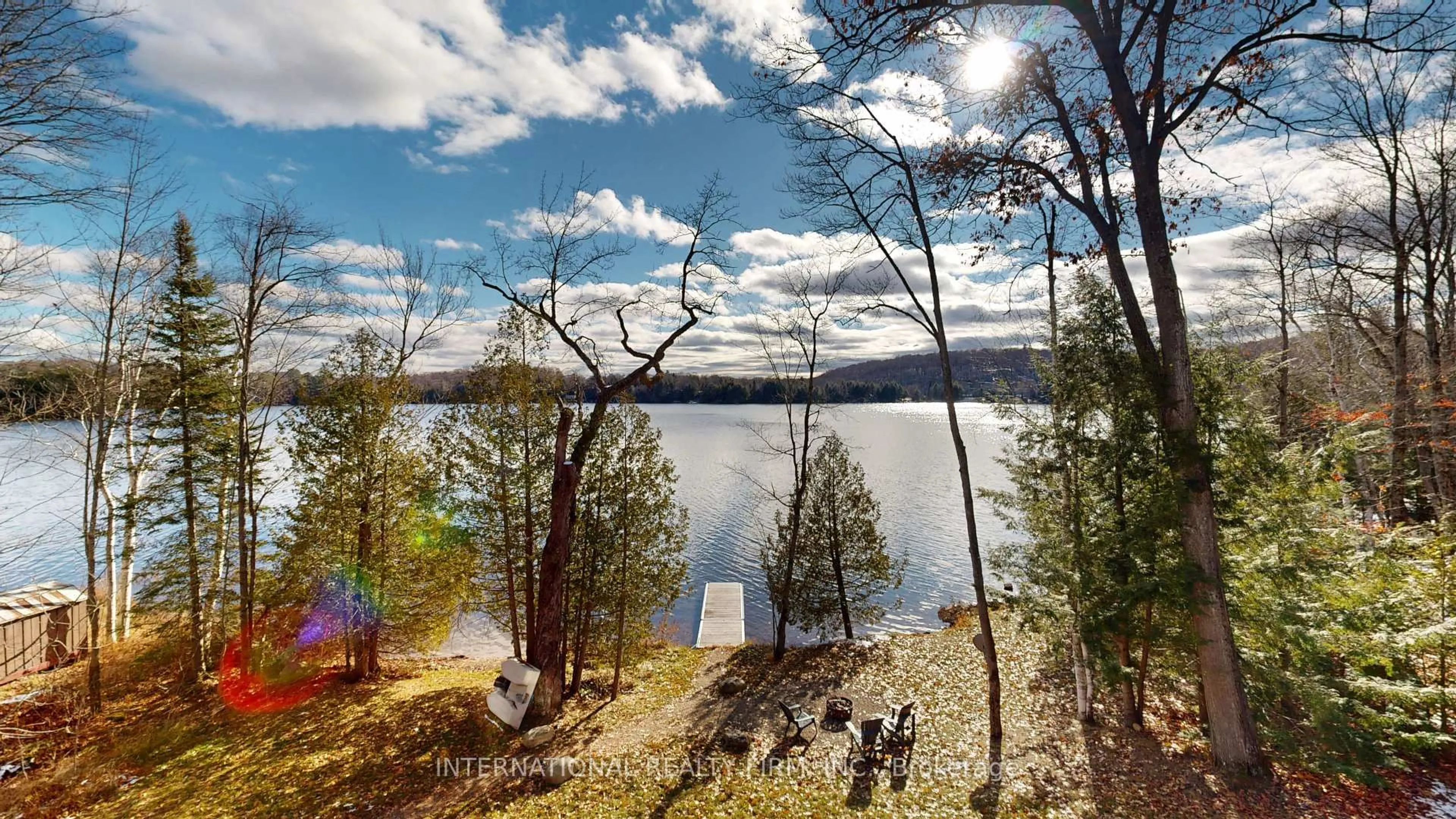 A pic from outside/outdoor area/front of a property/back of a property/a pic from drone, water/lake/river/ocean view for 1073 Watson Rd, Lake of Bays Ontario P0B 0A3