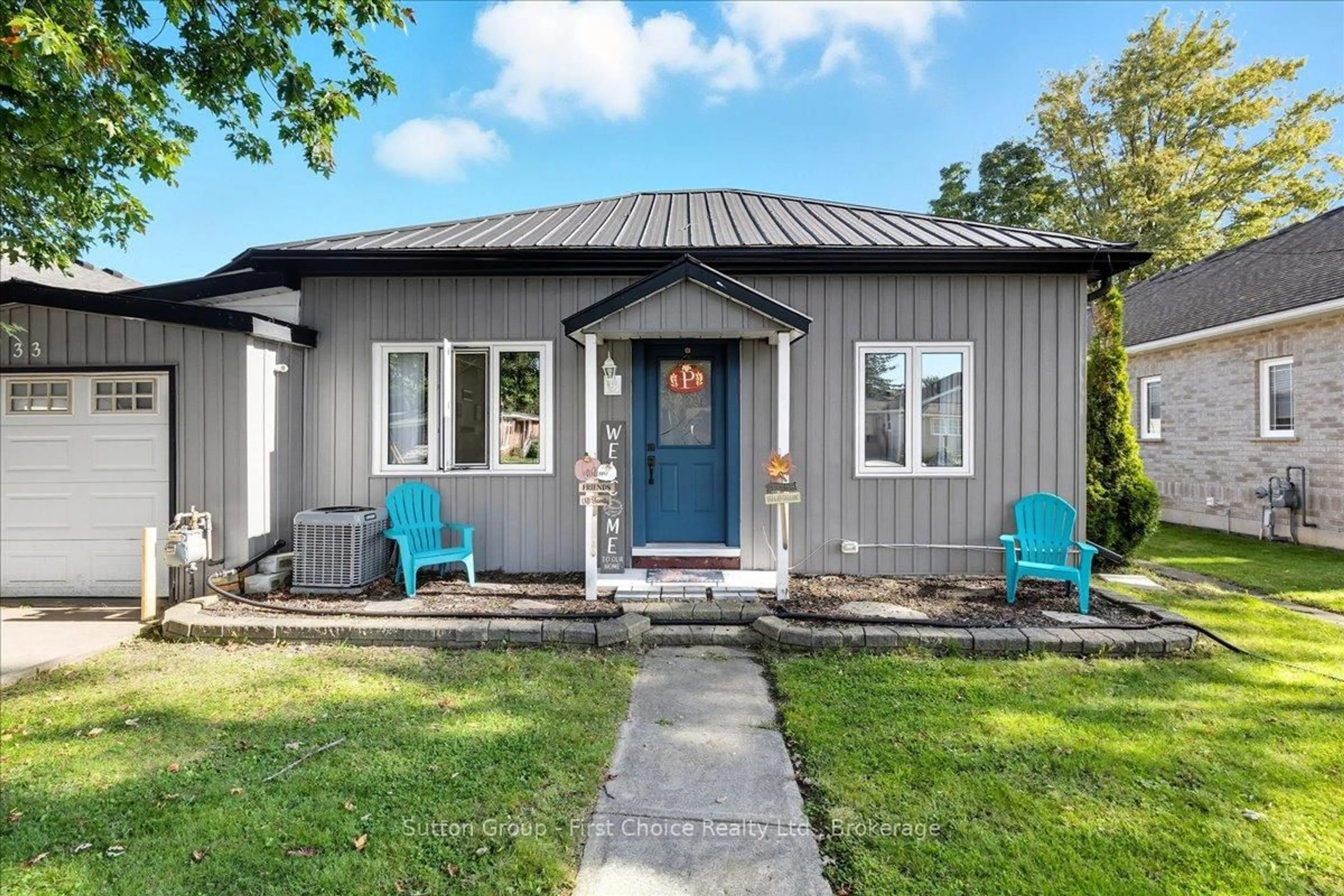 Home with vinyl exterior material, street for 33 Victoria St, West Perth Ontario N0K 1N0