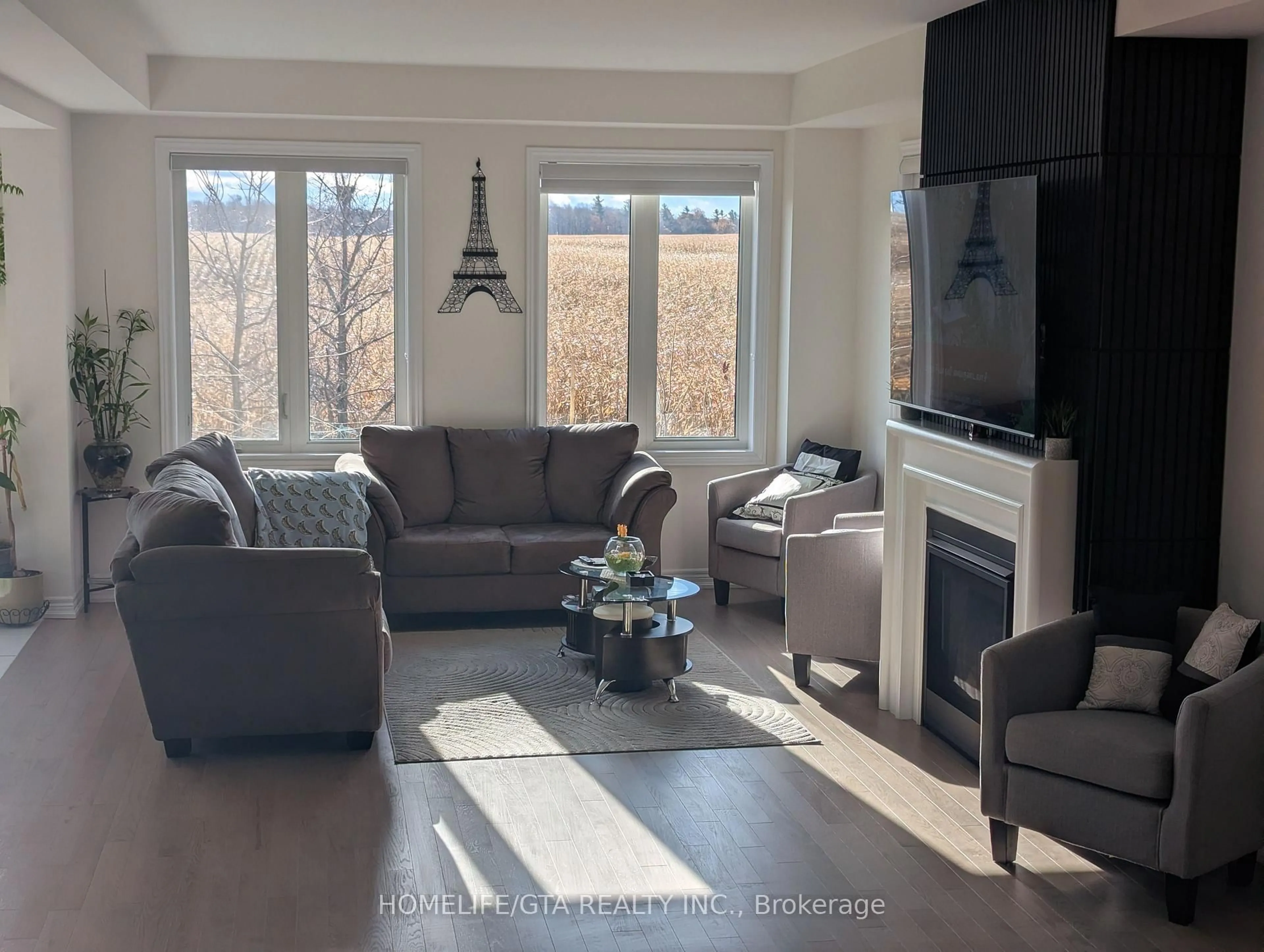 Living room with furniture, wood/laminate floor for 264 Broadacre Dr, Kitchener Ontario N2R 0S6