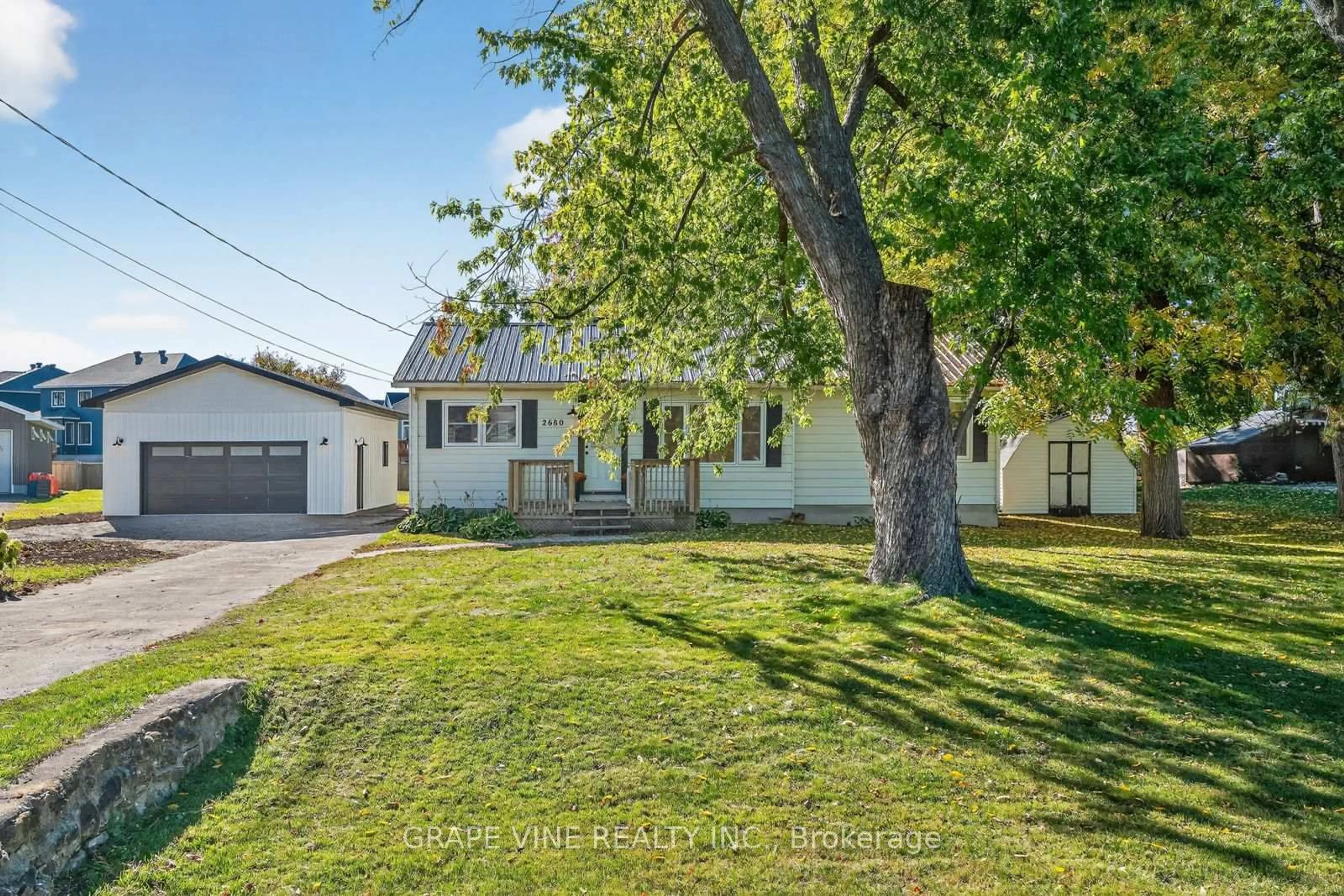 A pic from outside/outdoor area/front of a property/back of a property/a pic from drone, street for 2680 River Rd, North Grenville Ontario K0G 1J0