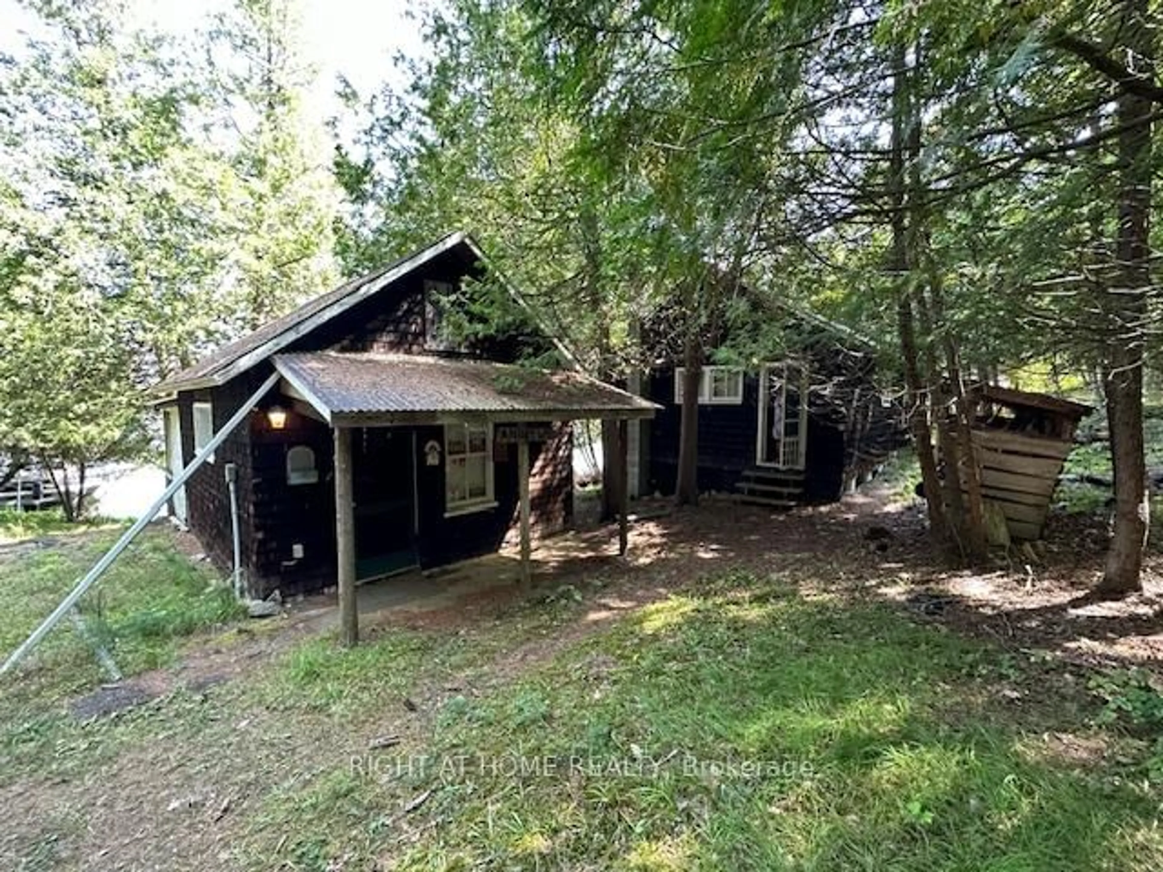 A pic from outside/outdoor area/front of a property/back of a property/a pic from drone, forest/trees view for 161 TAGGART Lane #B, Rideau Lakes Ontario K0G 1X0