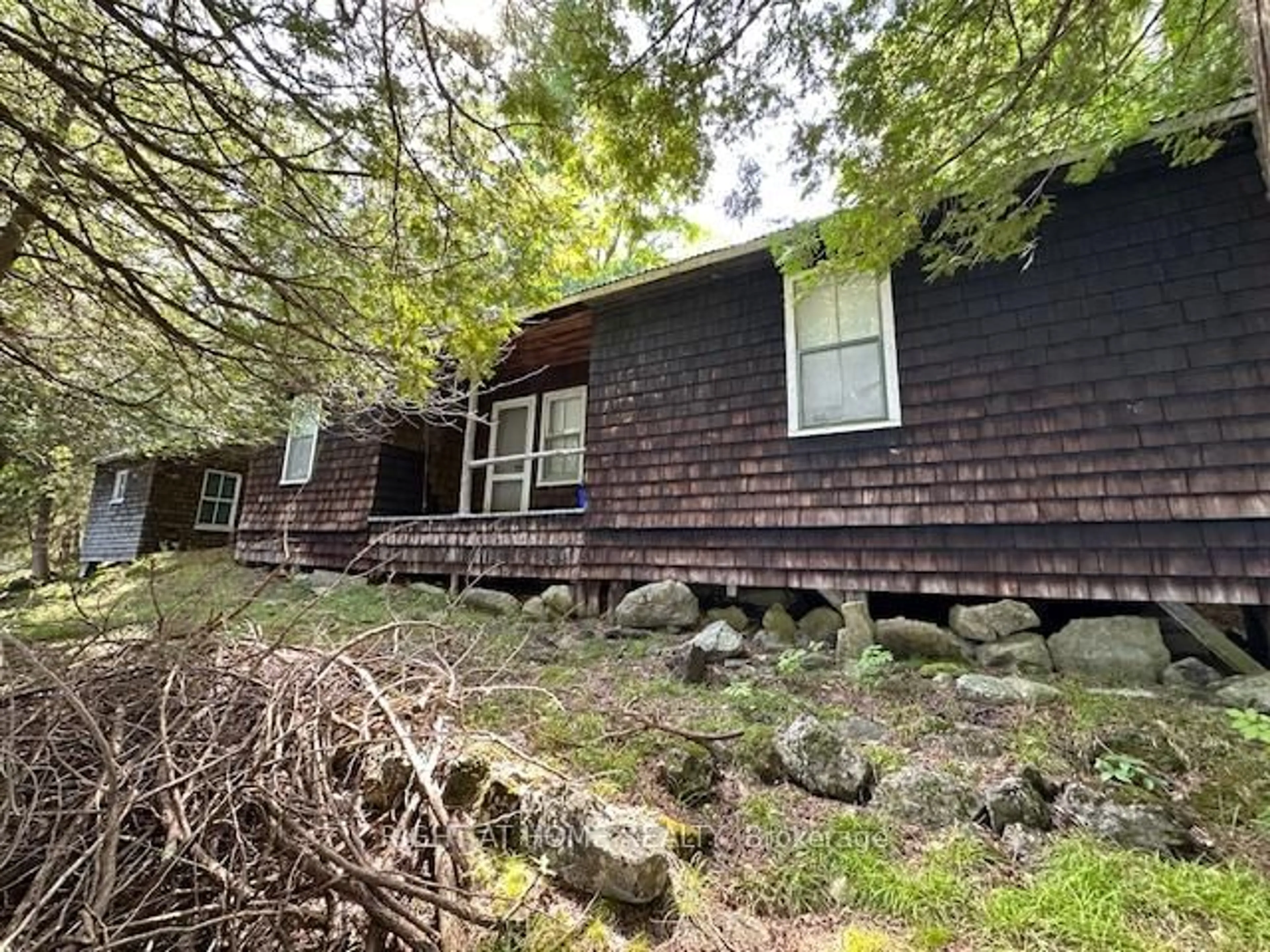 A pic from outside/outdoor area/front of a property/back of a property/a pic from drone, forest/trees view for 161 TAGGART Lane #B, Rideau Lakes Ontario K0G 1X0