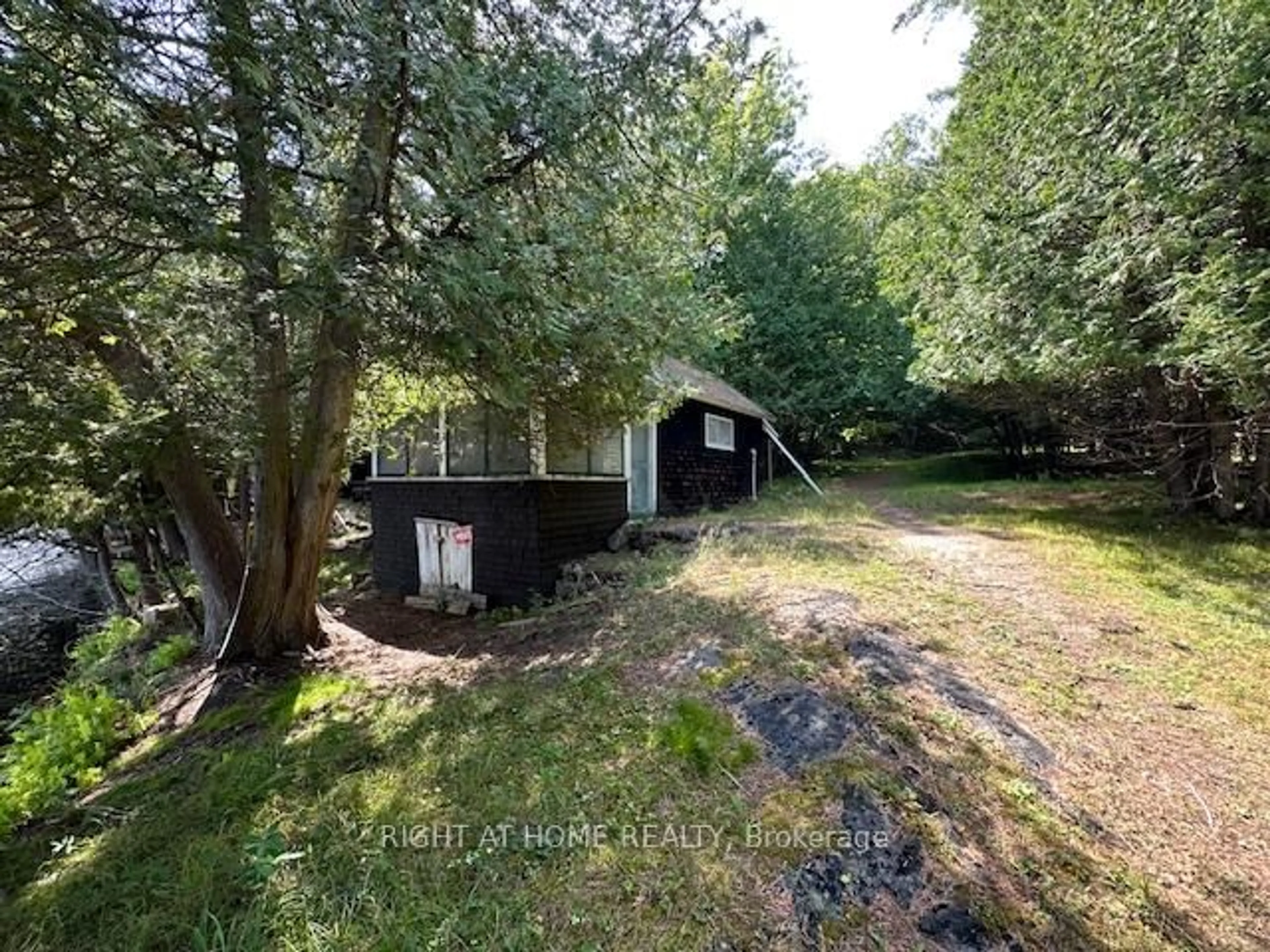 A pic from outside/outdoor area/front of a property/back of a property/a pic from drone, forest/trees view for 161 TAGGART Lane #B, Rideau Lakes Ontario K0G 1X0