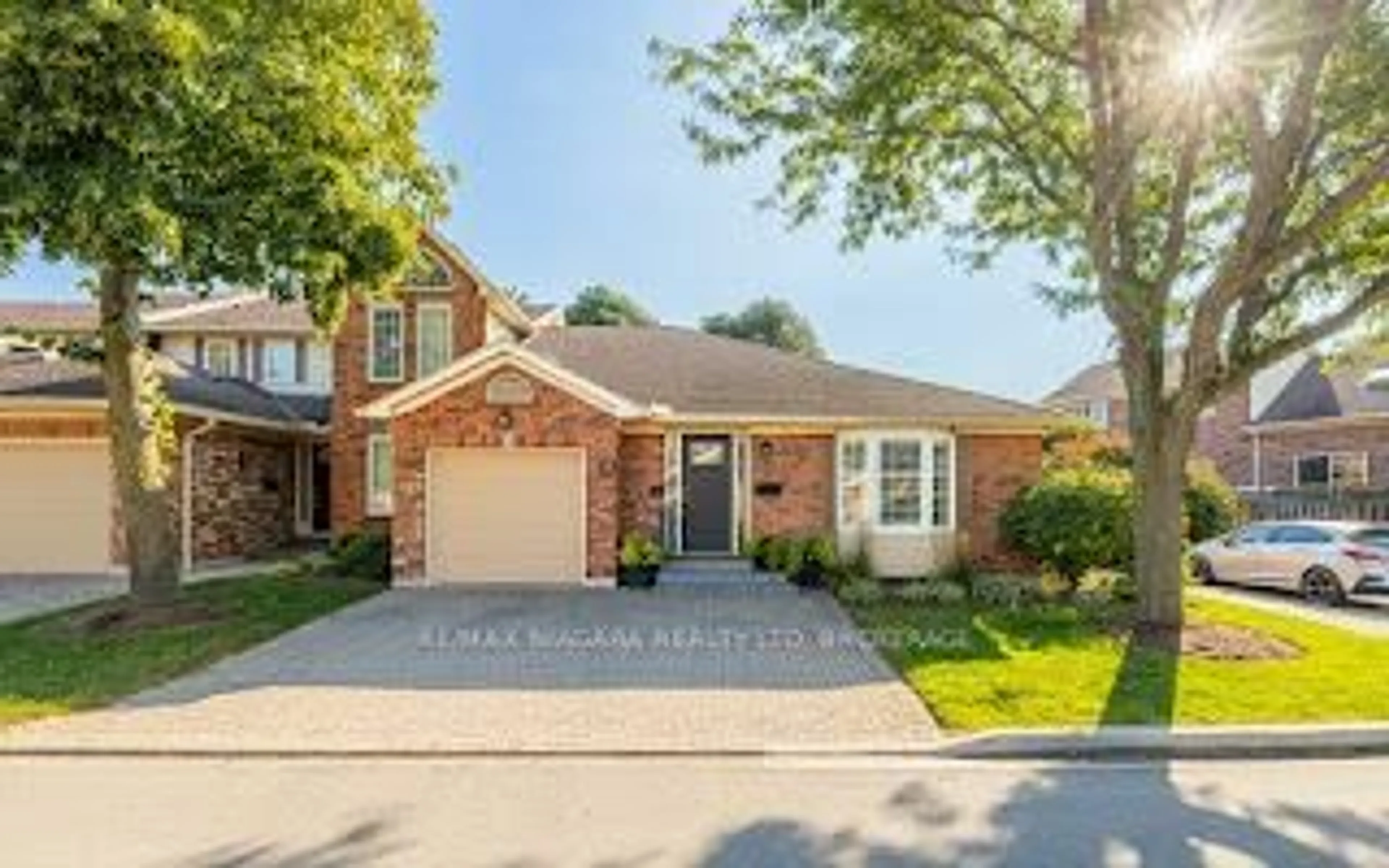 Home with brick exterior material, street for 141 Welland Vale Rd #21, St. Catharines Ontario L2S 3S7