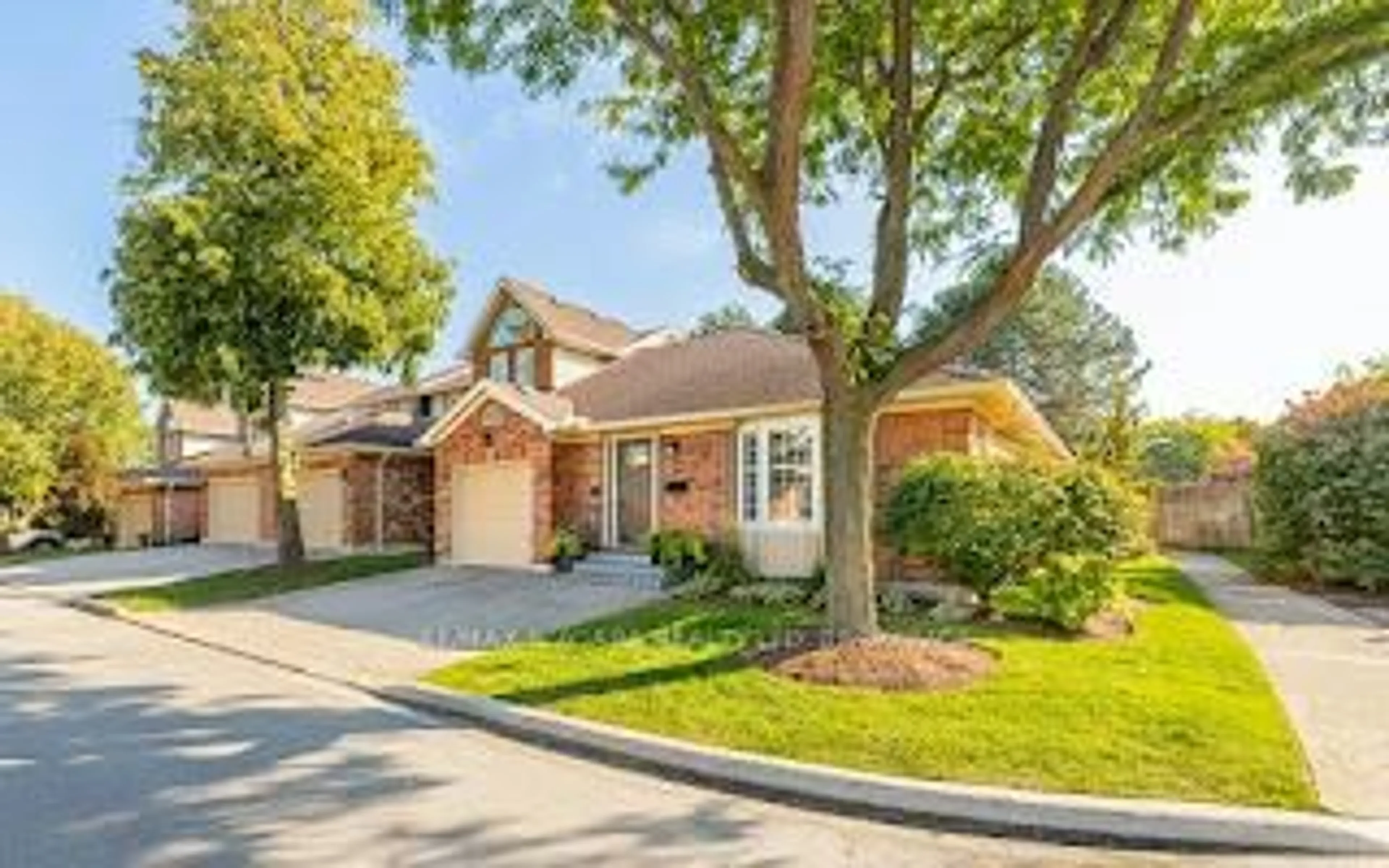 Home with brick exterior material, street for 141 Welland Vale Rd #21, St. Catharines Ontario L2S 3S7