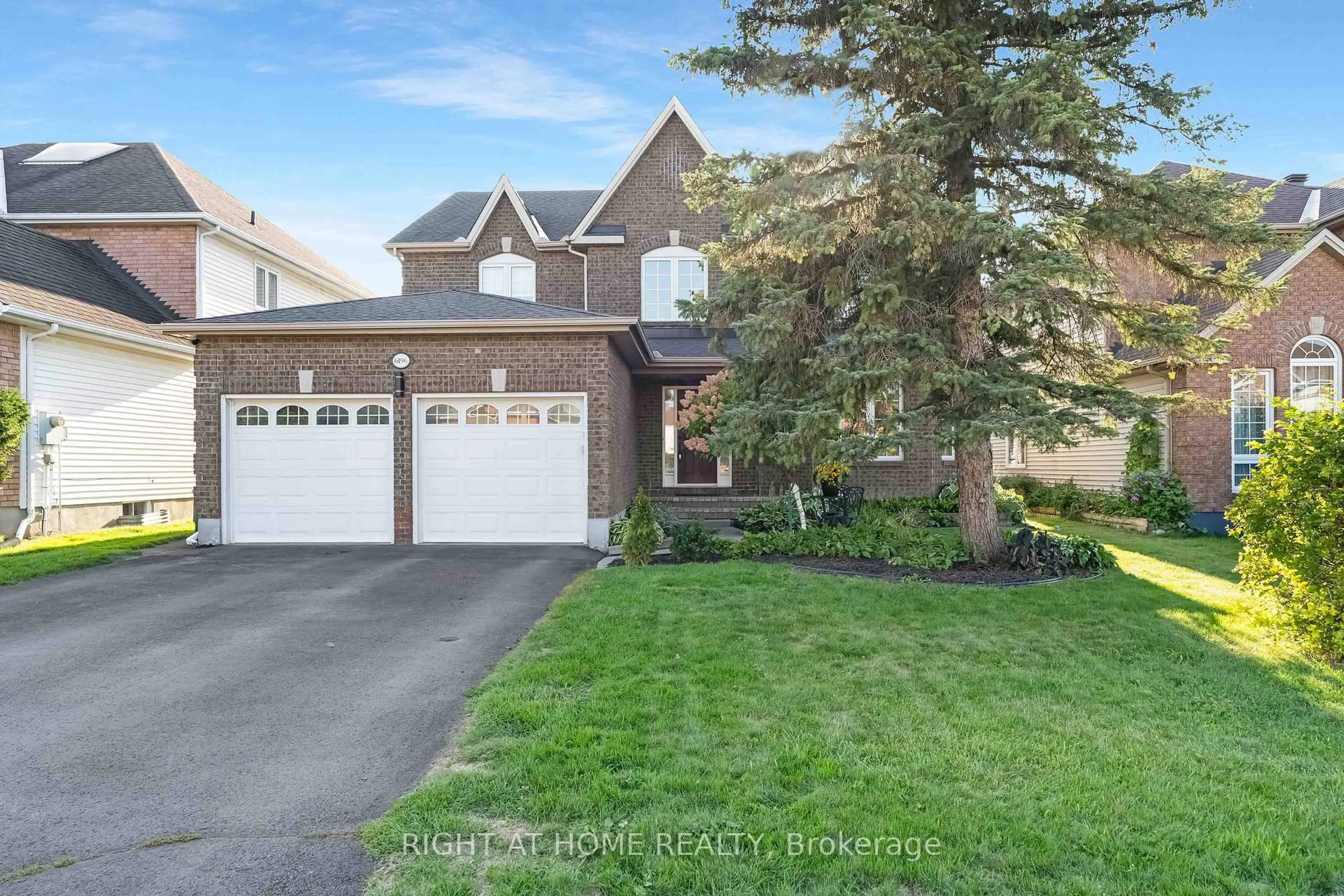 Home with vinyl exterior material, street for 6196 Ravine Way, Orleans Ontario K1C 2W4