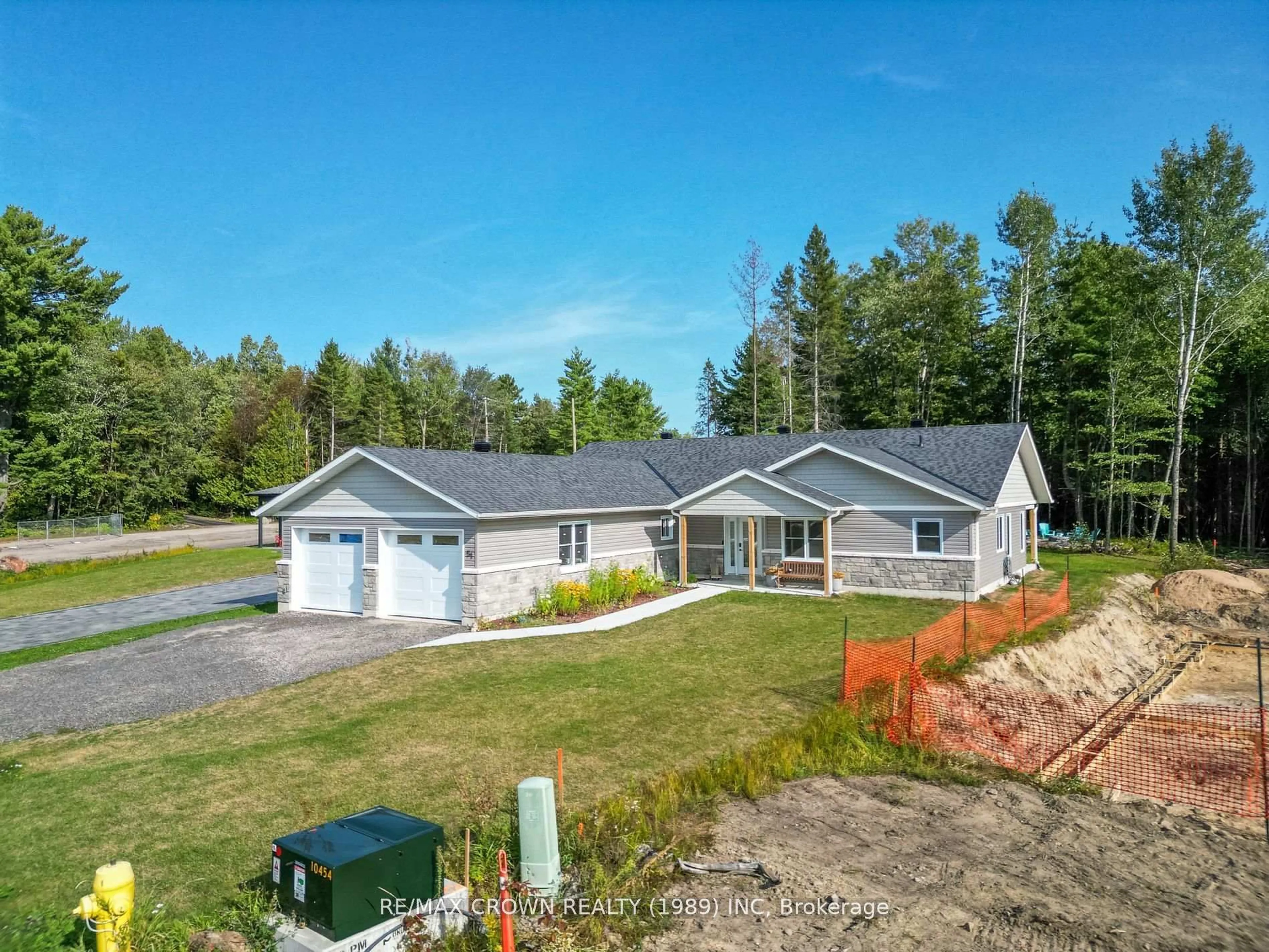 A pic from outside/outdoor area/front of a property/back of a property/a pic from drone, water/lake/river/ocean view for 51 Masson Lane, Callander Ontario P0H 1H0