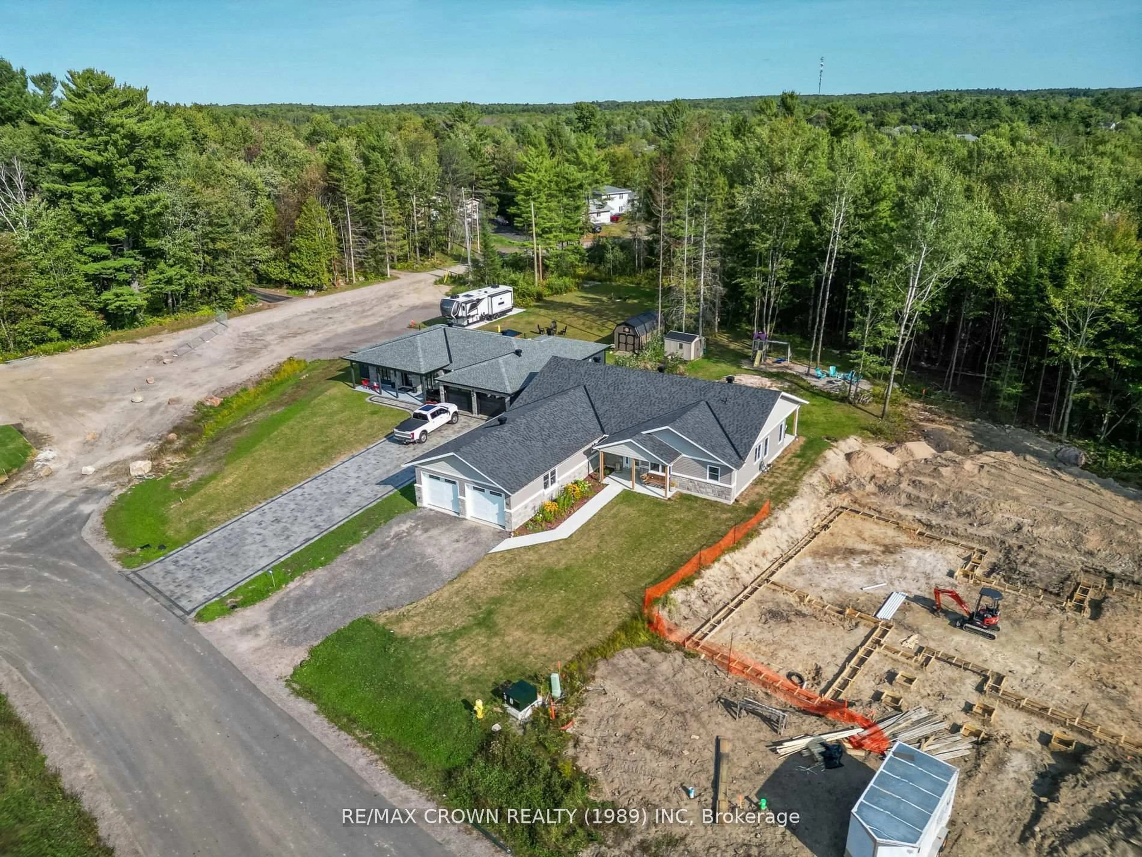 A pic from outside/outdoor area/front of a property/back of a property/a pic from drone, unknown for 51 Masson Lane, Callander Ontario P0H 1H0