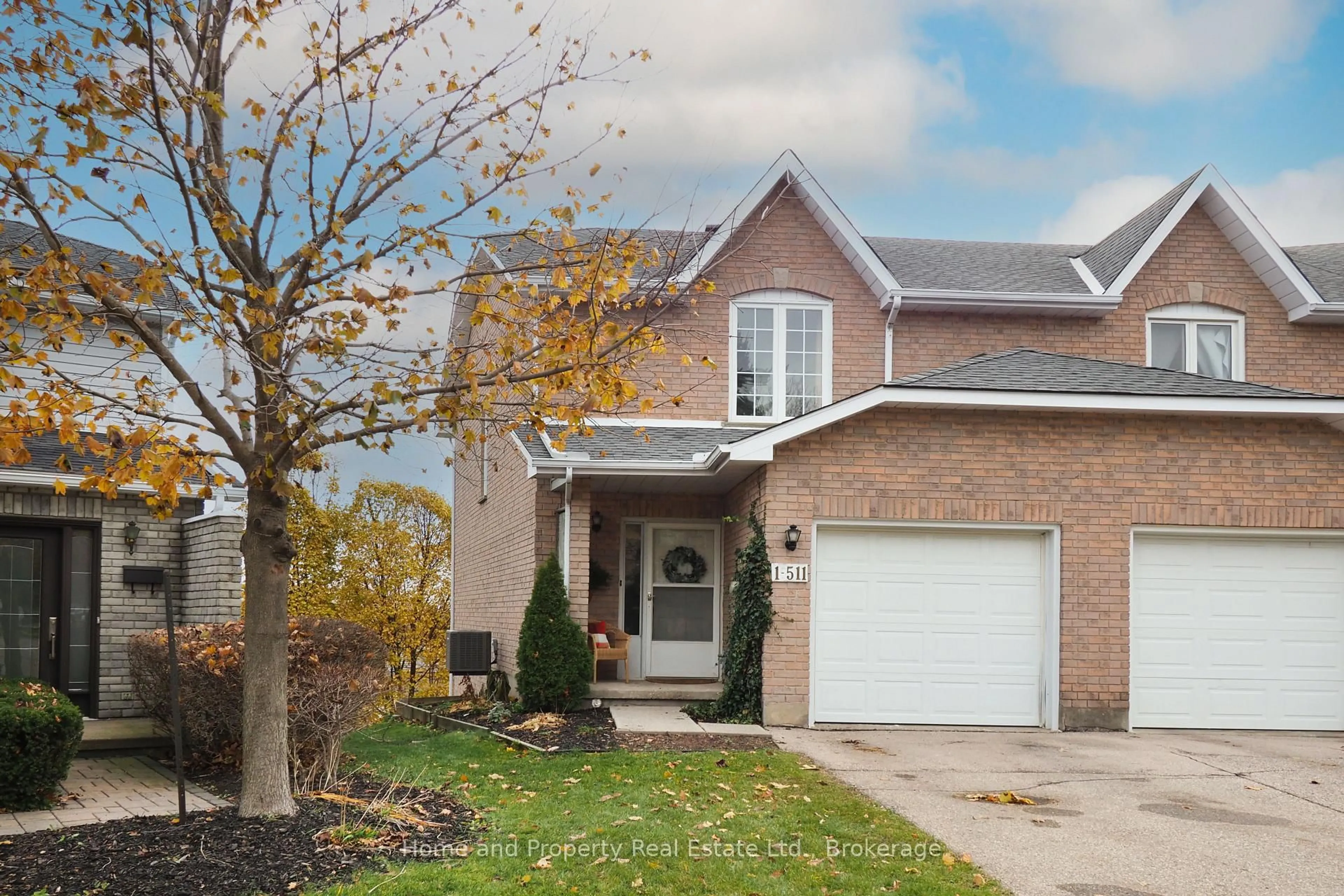 Home with brick exterior material, street for 511 Oakvale Dr #1, Waterloo Ontario N2T 2G6