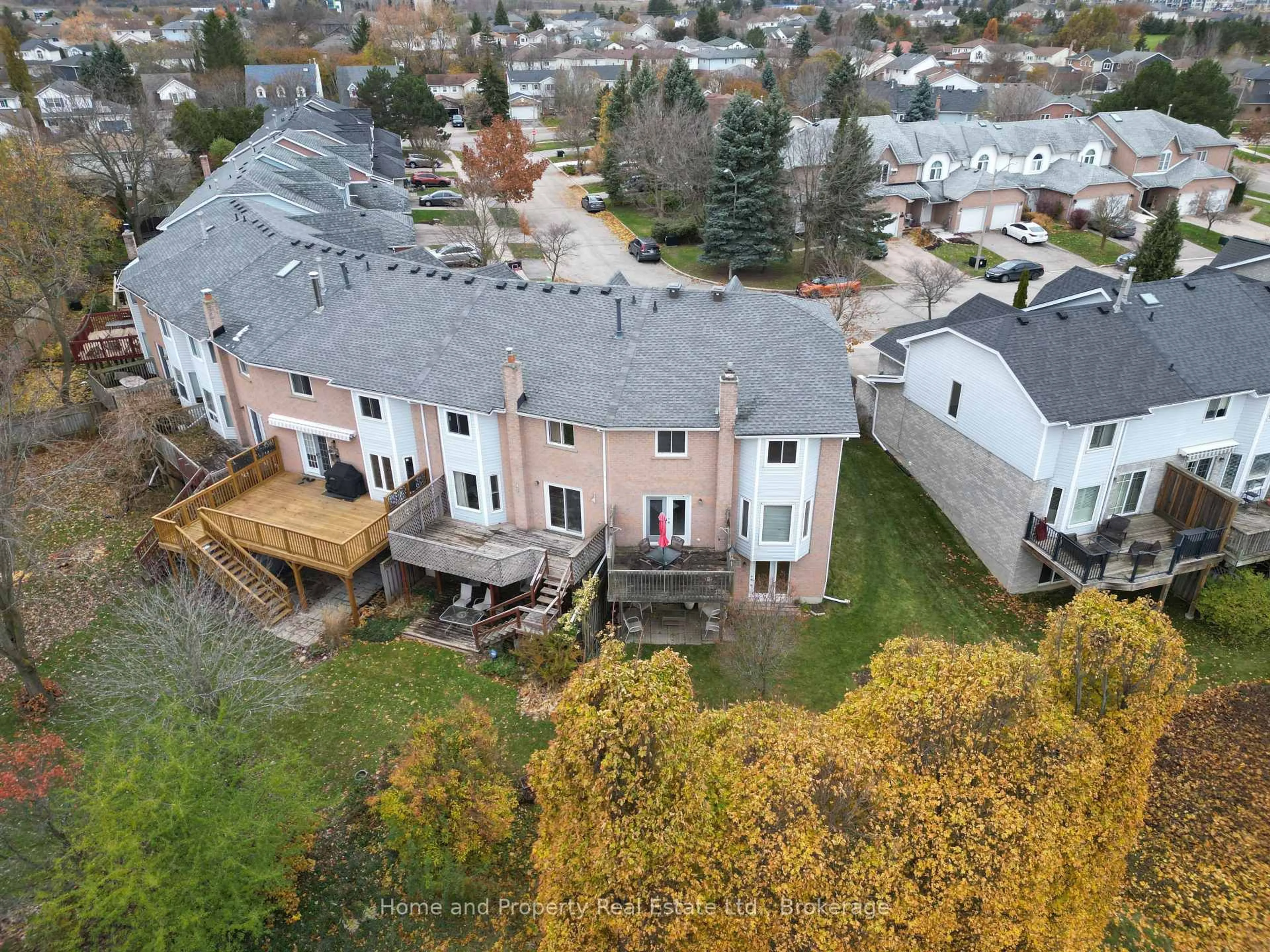 A pic from outside/outdoor area/front of a property/back of a property/a pic from drone, unknown for 511 Oakvale Dr #1, Waterloo Ontario N2T 2G6