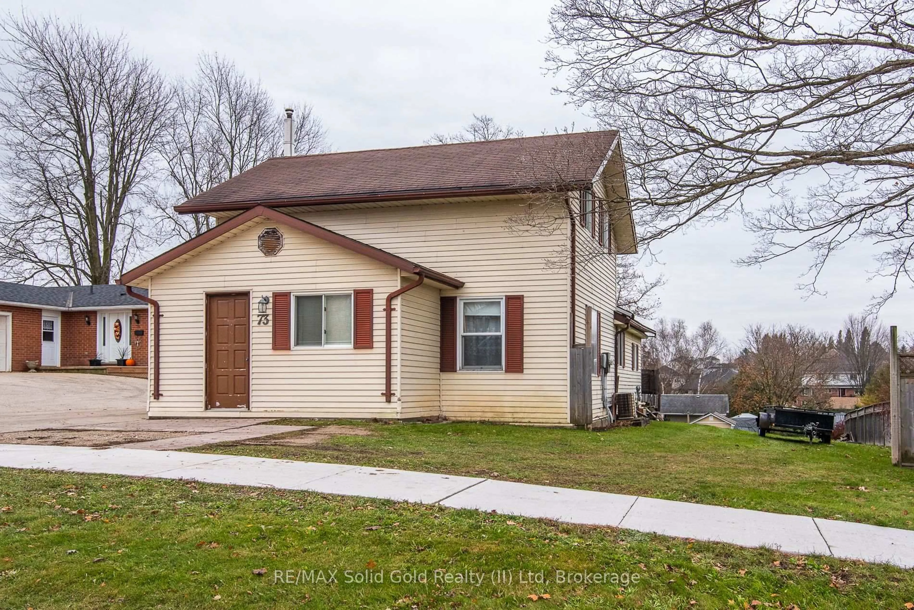 Home with vinyl exterior material, street for 73 Main Street East St, Mapleton Ontario N0G 1P0