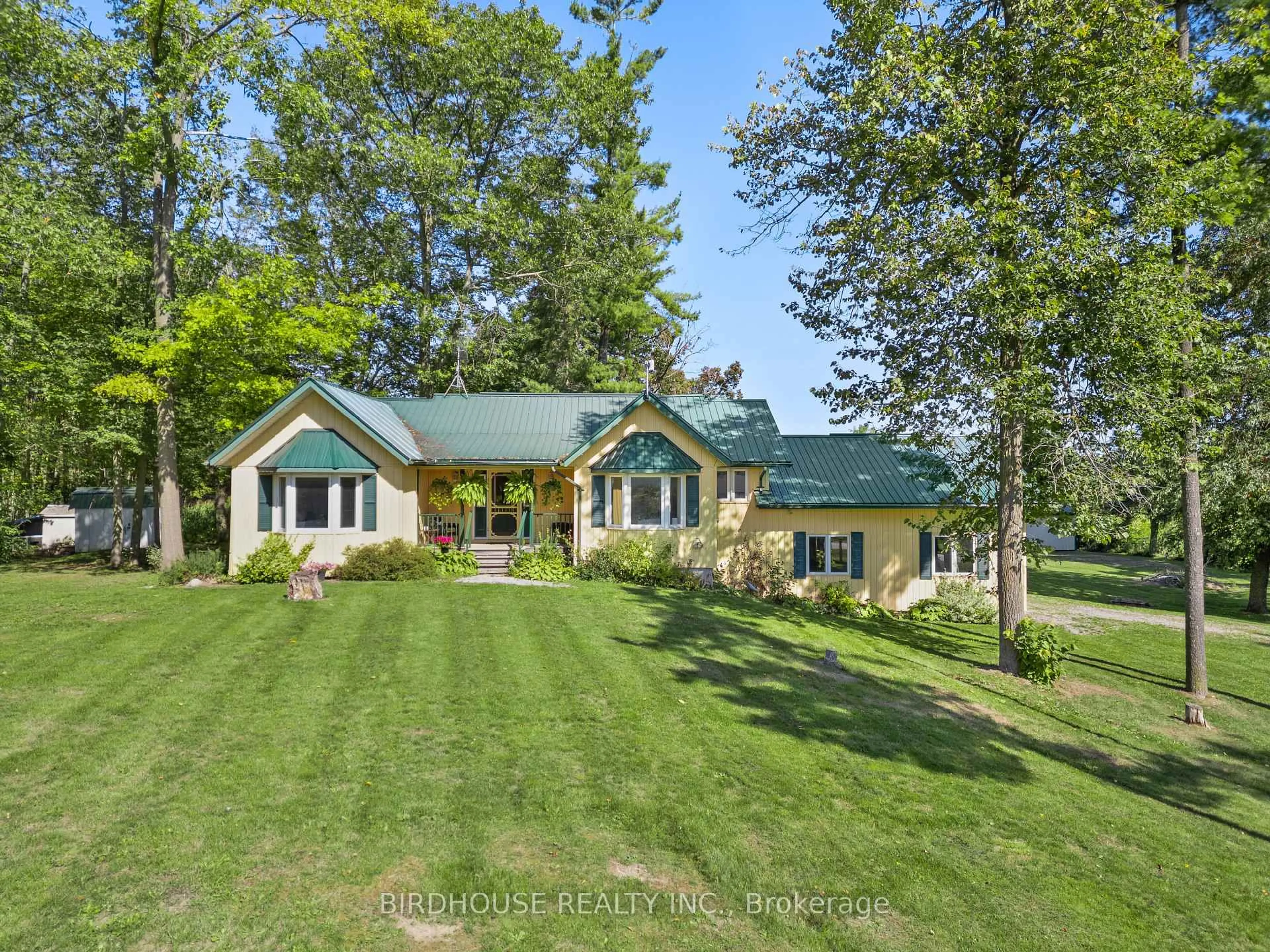A pic from outside/outdoor area/front of a property/back of a property/a pic from drone, unknown for 651 The Glen Rd, Kawartha Lakes Ontario K0M 2T0
