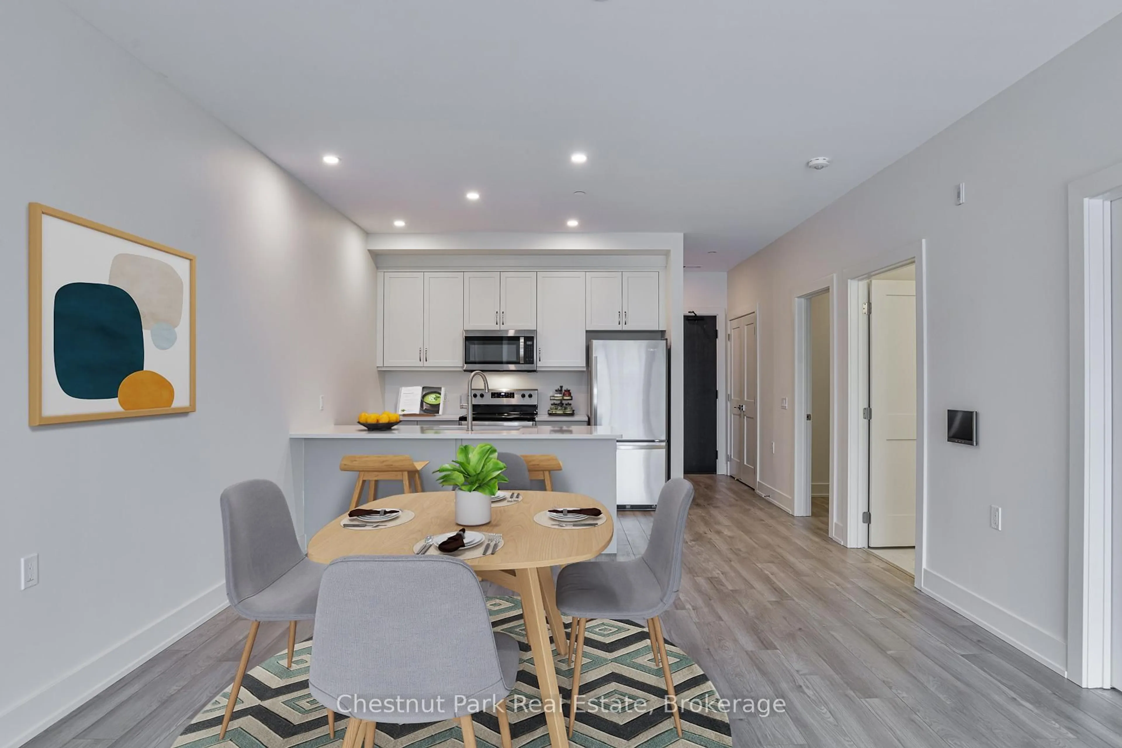 Open concept kitchen, wood/laminate floor for 20 CAMPUS Tr #403, Huntsville Ontario P1H 0K2