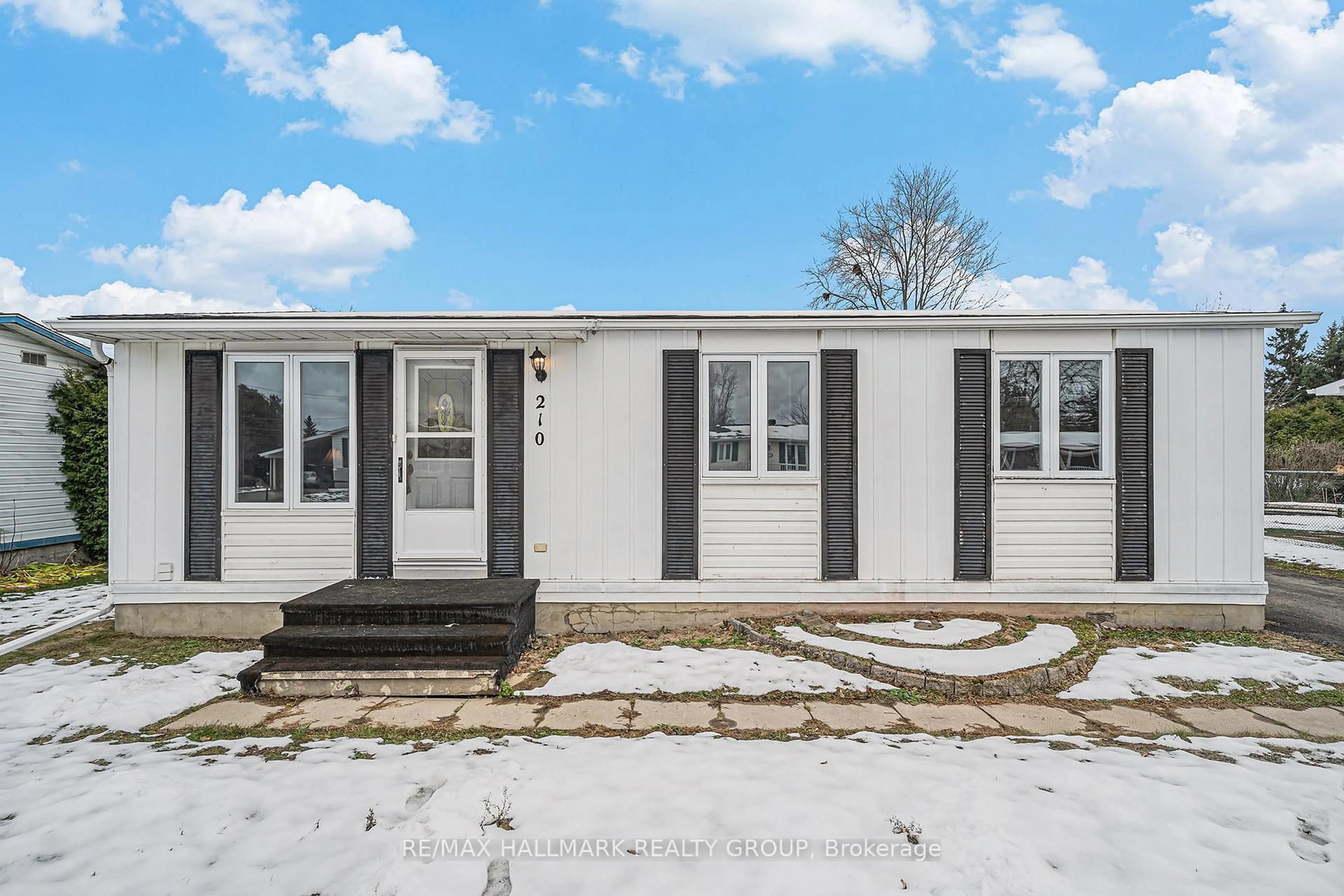 Home with vinyl exterior material, street for 210 Dodson St, North Grenville Ontario K0G 1J0