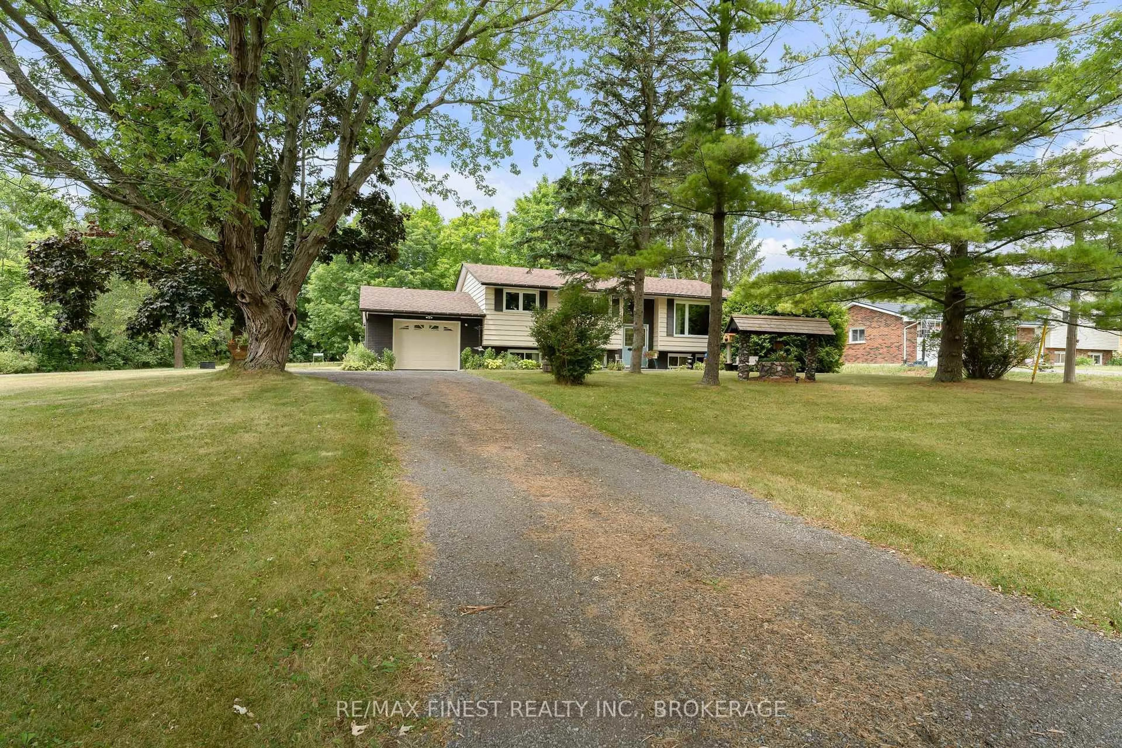A pic from outside/outdoor area/front of a property/back of a property/a pic from drone, street for 1089 County Road 9 Rd, Greater Napanee Ontario K7R 0E4