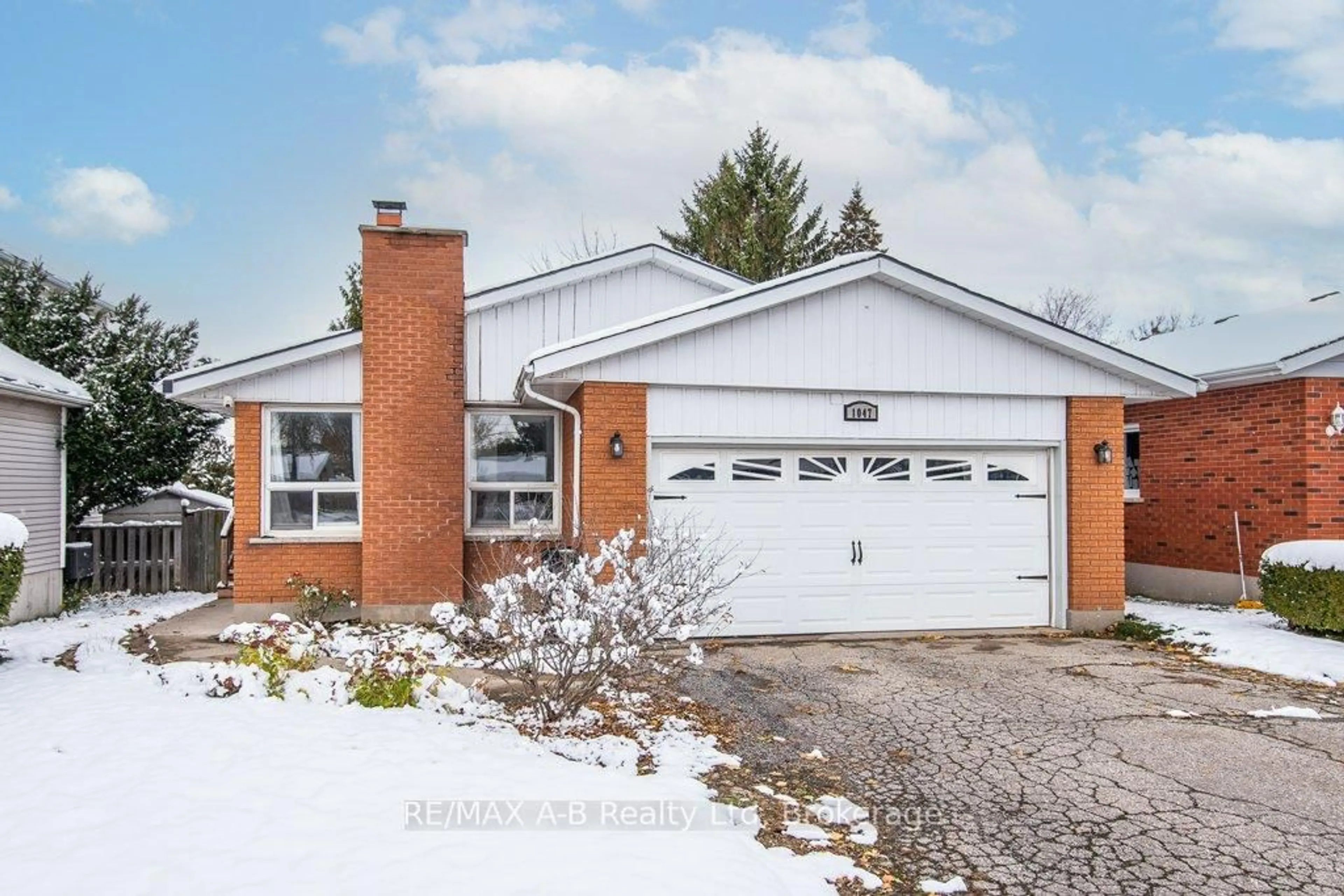 Home with brick exterior material, street for 1047 Devonshire Ave, Woodstock Ontario N4S 5S1