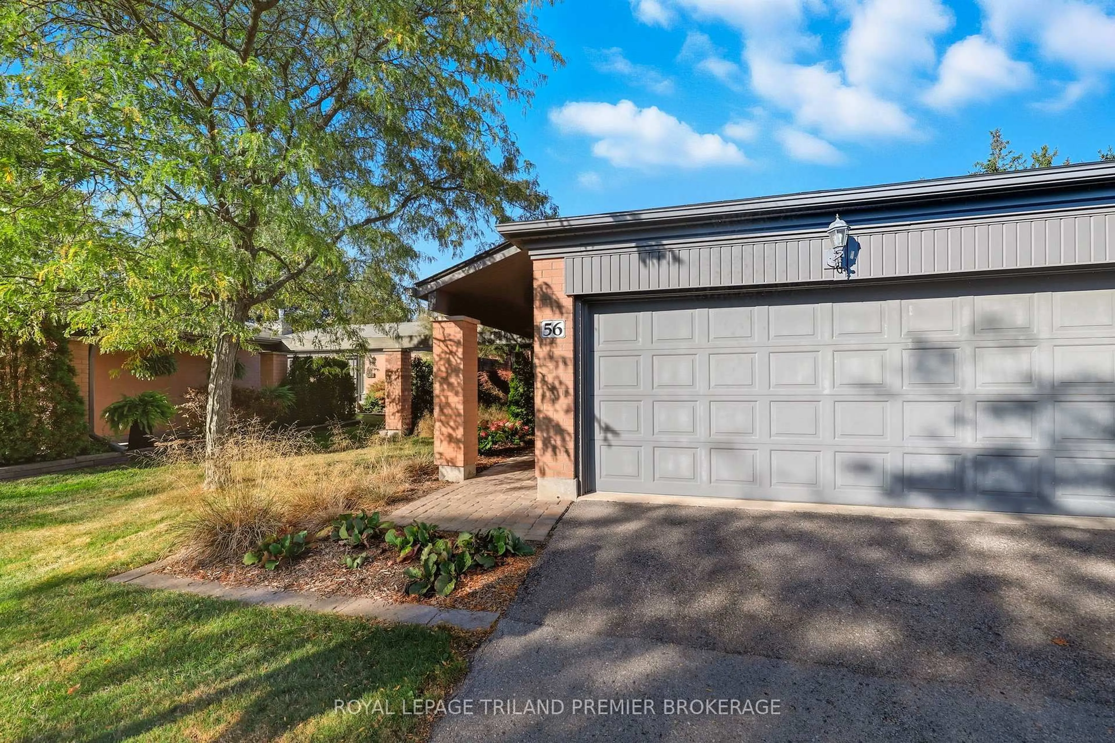 Home with brick exterior material, street for 50 Fiddlers Green Rd #56, London North Ontario N6H 4T4