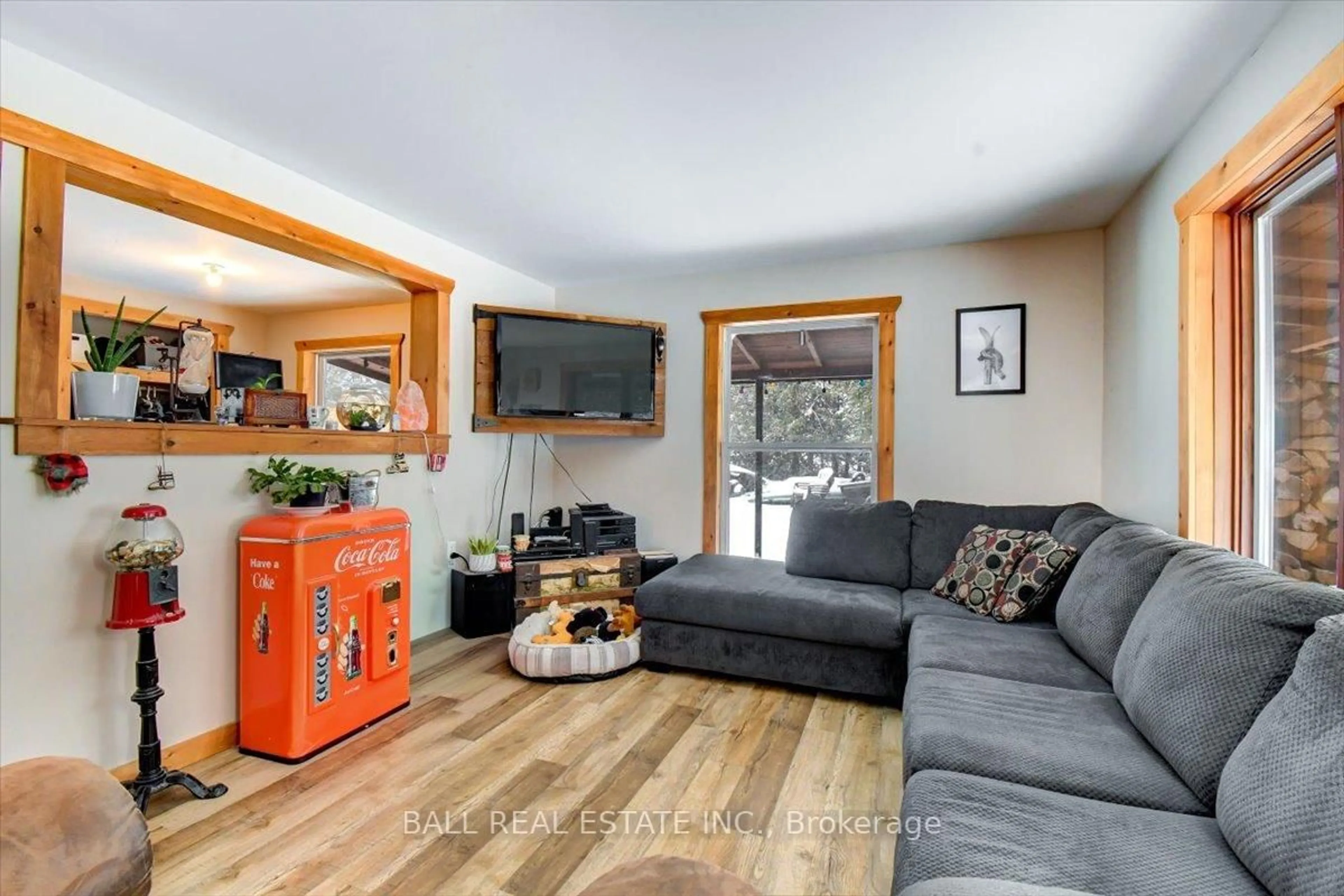 Living room with furniture, wood/laminate floor for 7 Upper Turriff Rd, Bancroft Ontario K0L 2L0