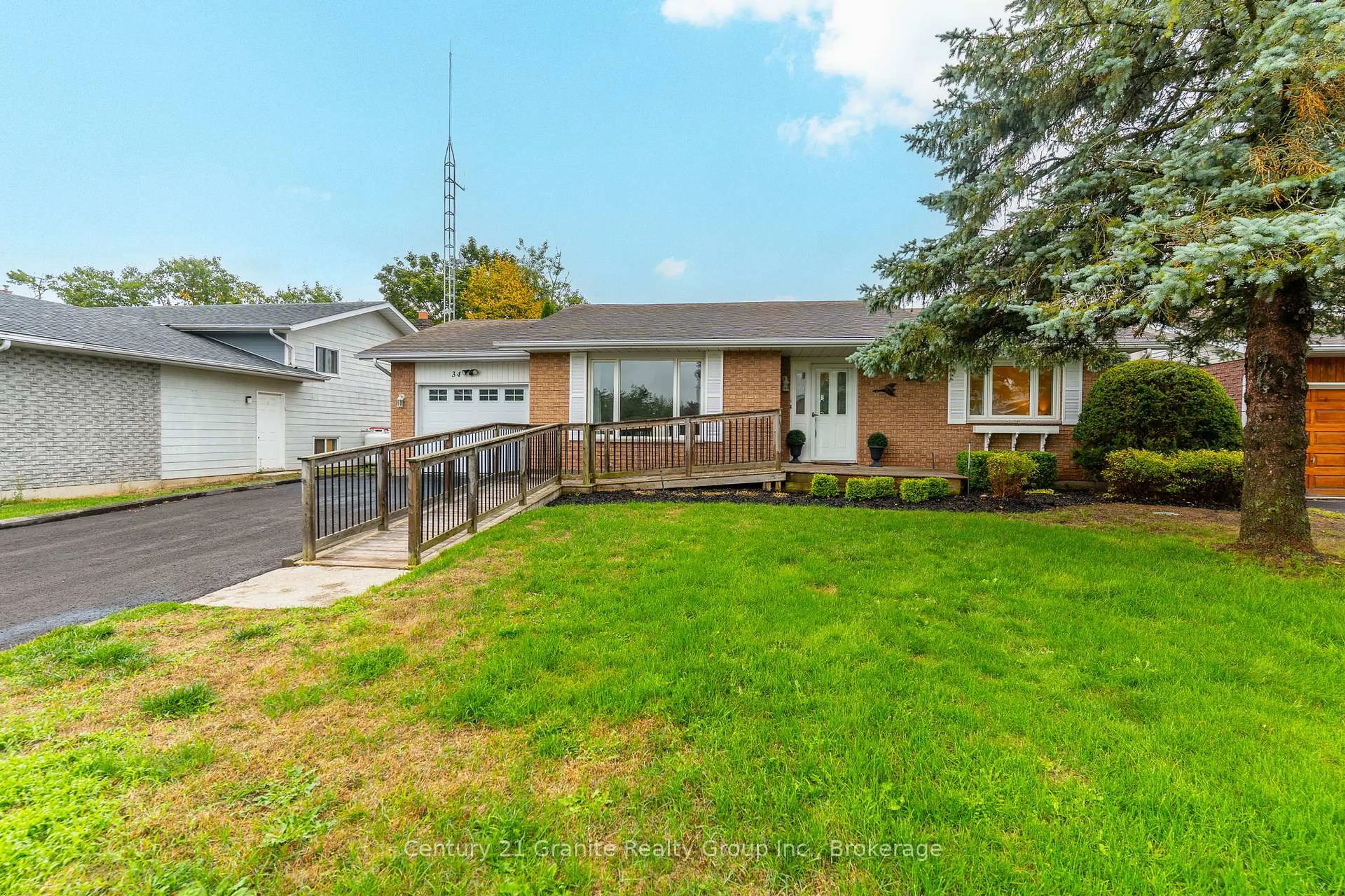 A pic from outside/outdoor area/front of a property/back of a property/a pic from drone, street for 34 Cedartree Lane, Kawartha Lakes Ontario K0M 1A0