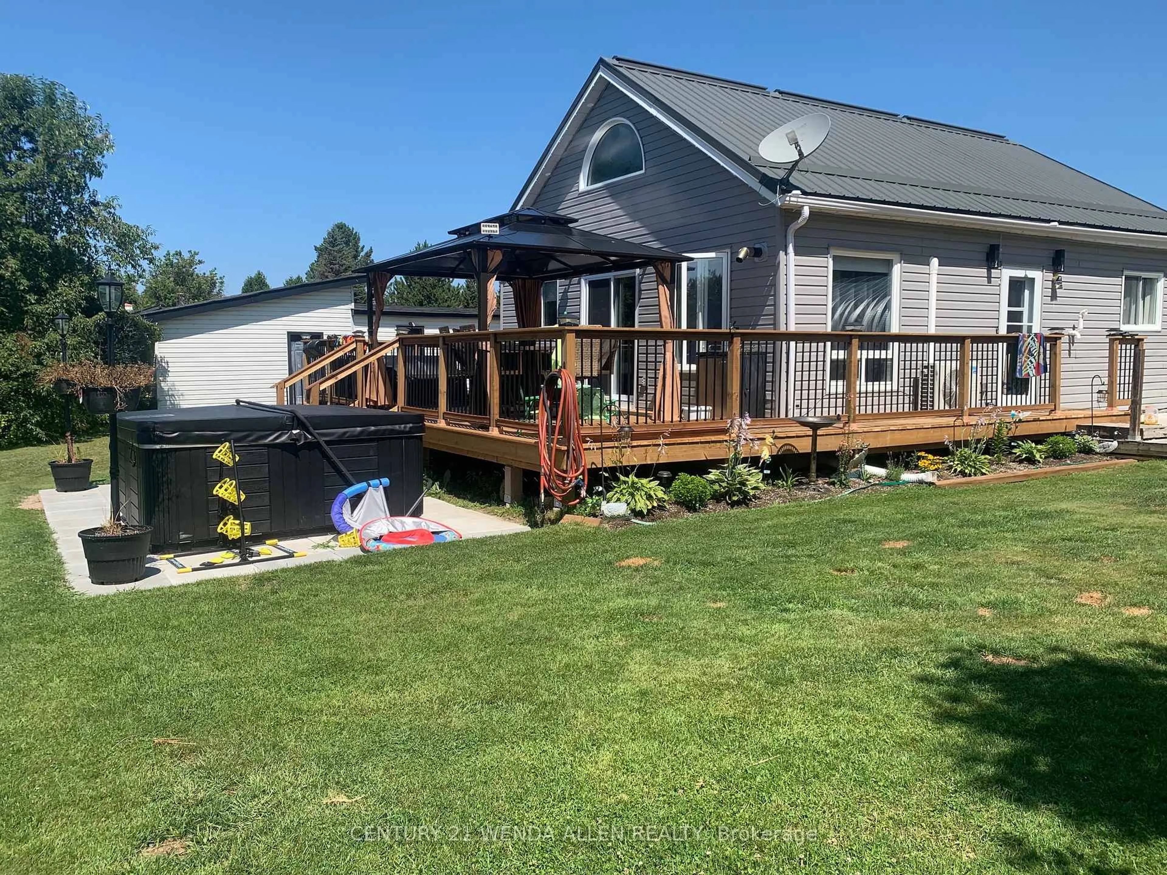 A pic from outside/outdoor area/front of a property/back of a property/a pic from drone, water/lake/river/ocean view for 102 Church St, Bonfield Ontario P0H 1E0