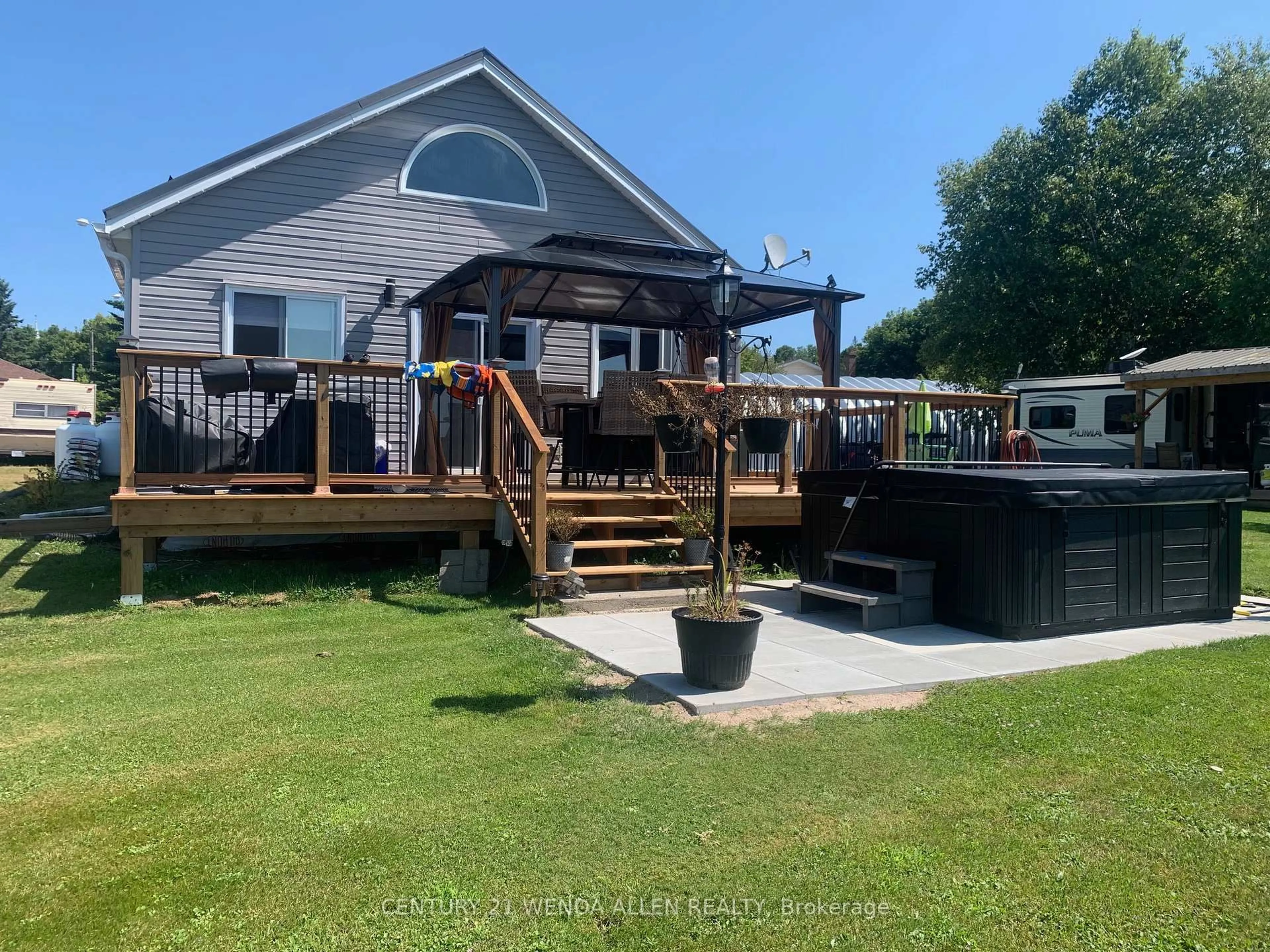 A pic from outside/outdoor area/front of a property/back of a property/a pic from drone, water/lake/river/ocean view for 102 Church St, Bonfield Ontario P0H 1E0
