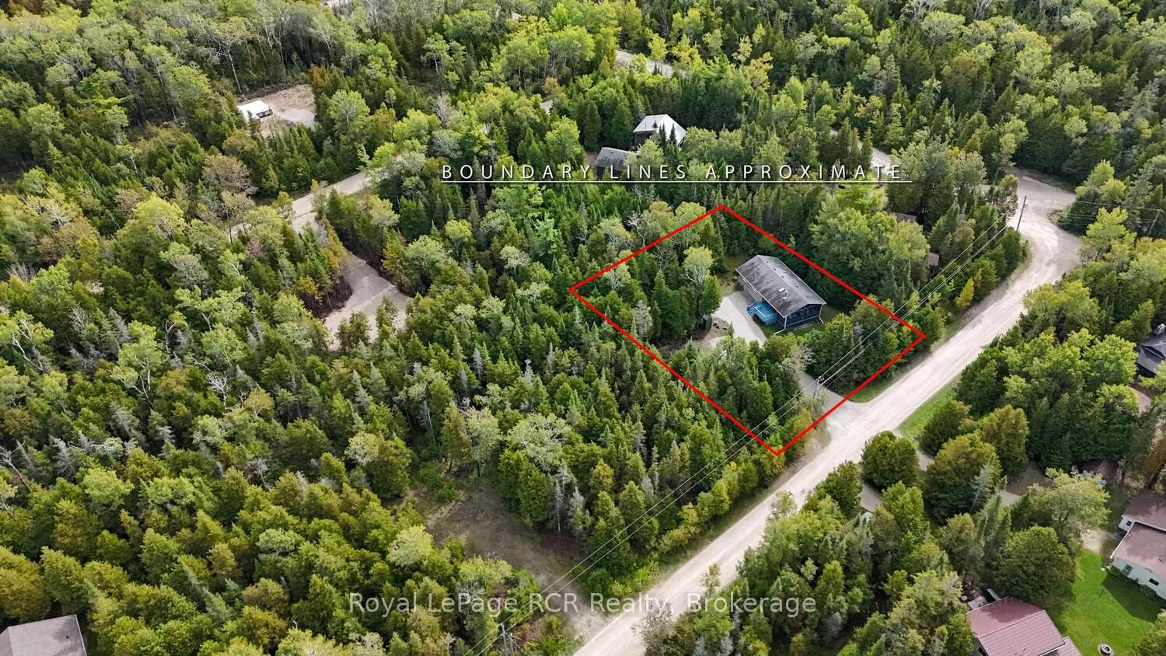 A pic from outside/outdoor area/front of a property/back of a property/a pic from drone, forest/trees view for 8 Molly St, Northern Bruce Peninsula Ontario N0H 1W0