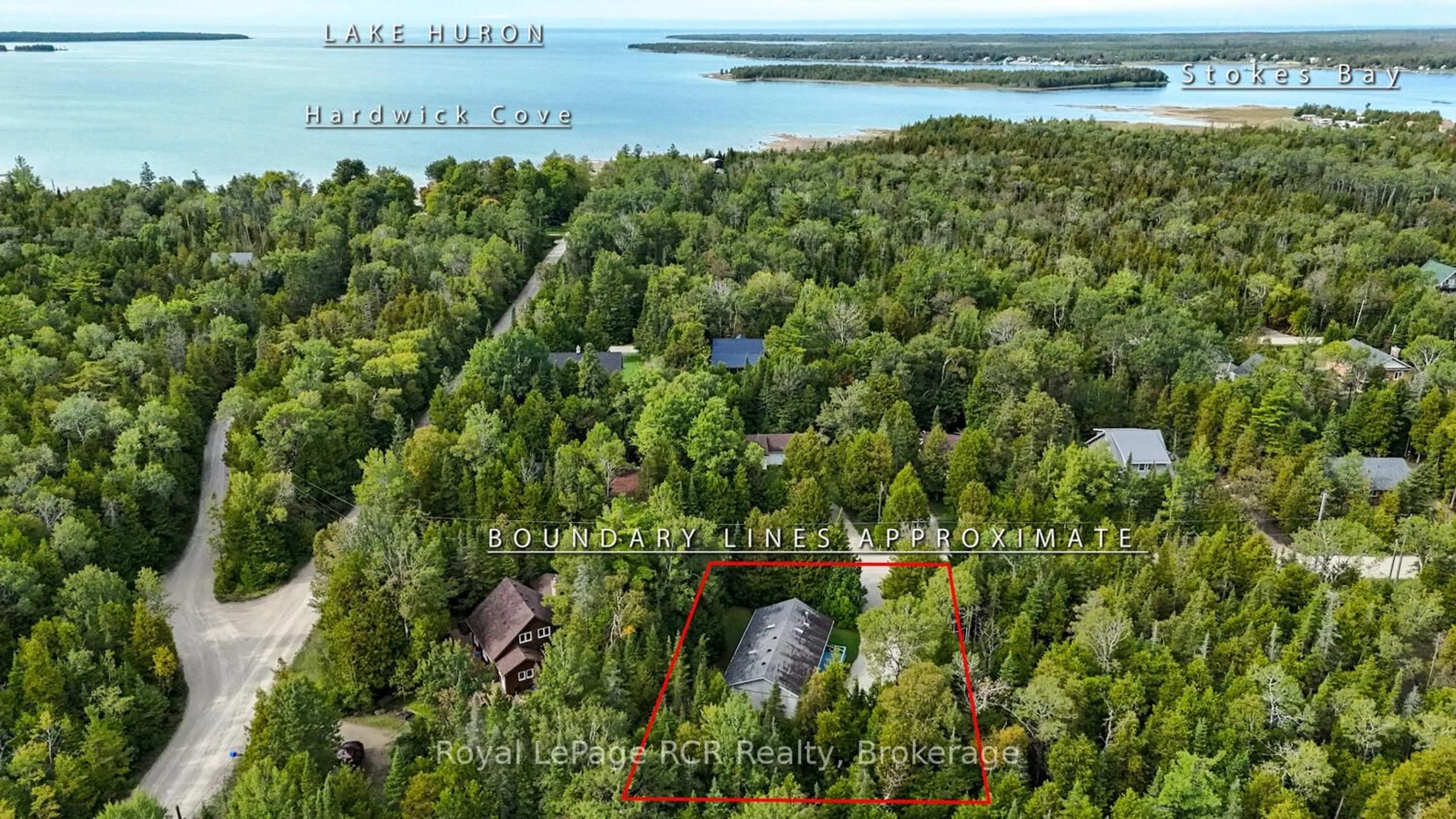 A pic from outside/outdoor area/front of a property/back of a property/a pic from drone, water/lake/river/ocean view for 8 Molly St, Northern Bruce Peninsula Ontario N0H 1W0
