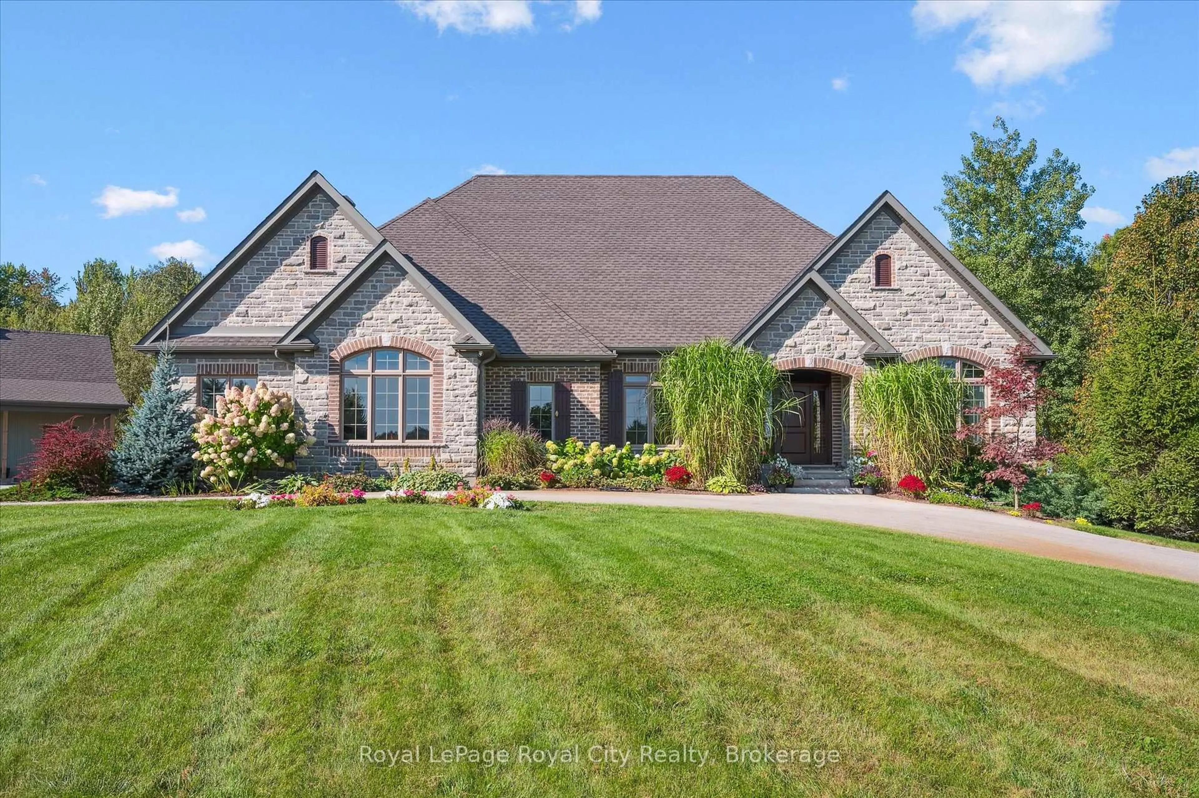 Home with brick exterior material, street for 28 Serena Lane, Guelph Ontario N1L 1E7