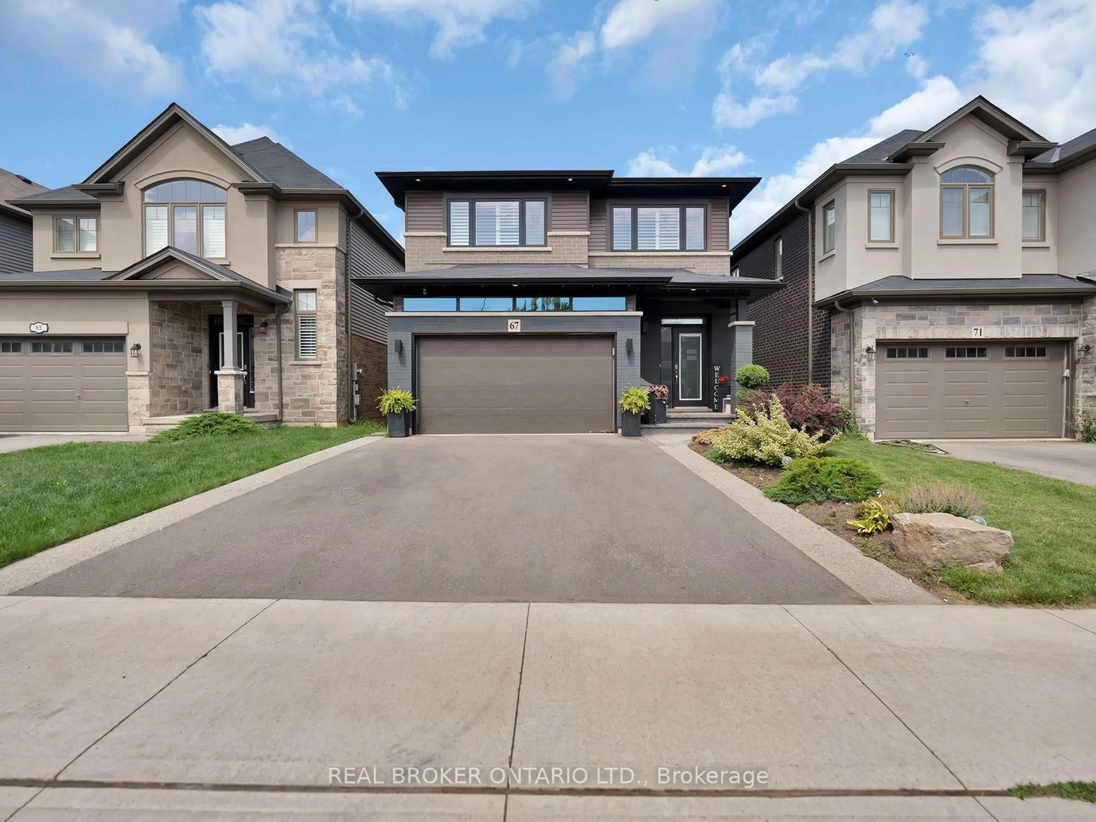 Home with brick exterior material, street for 67 Lexington Ave, Hamilton Ontario L8J 0L5