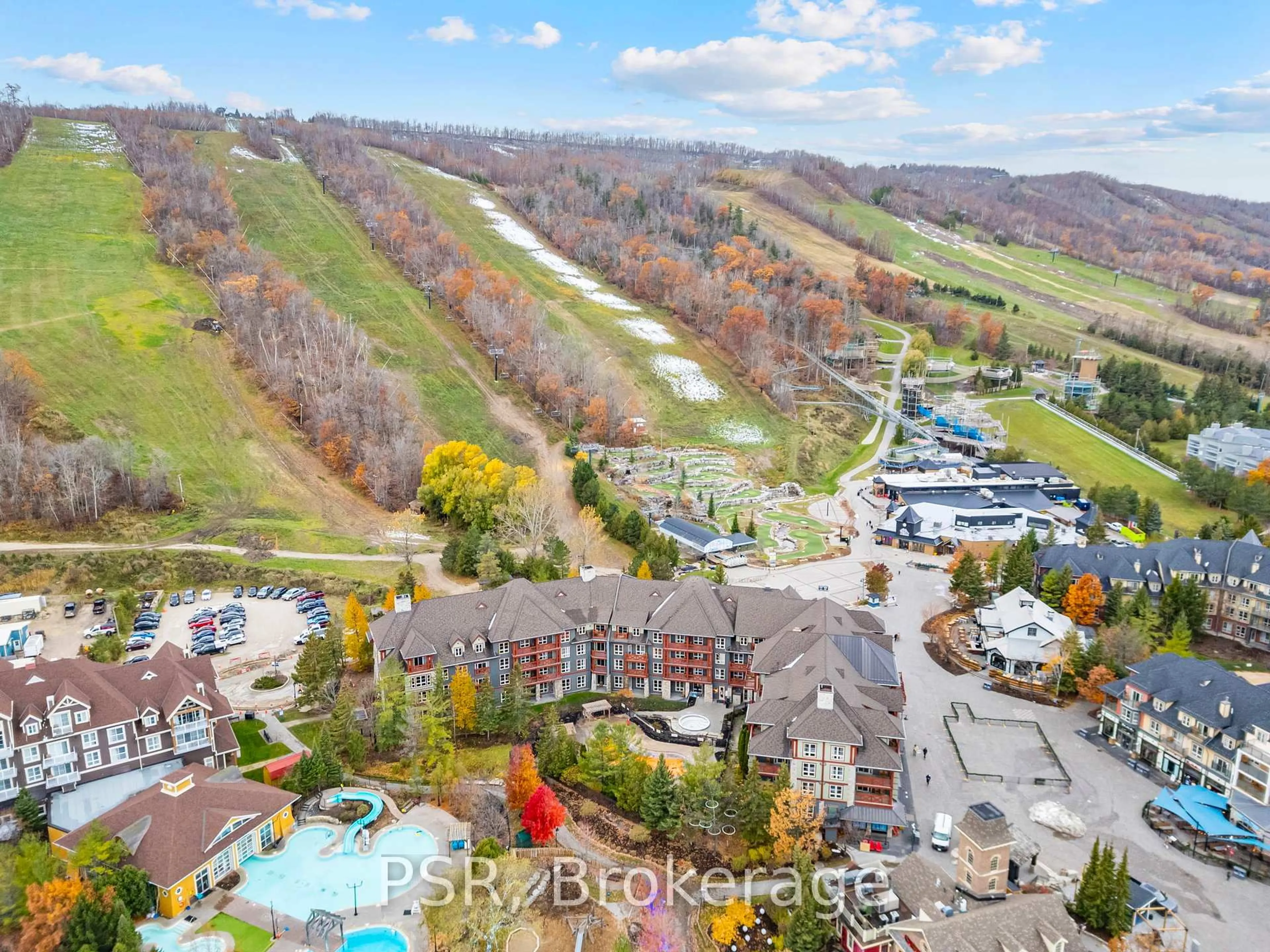 A pic from outside/outdoor area/front of a property/back of a property/a pic from drone, mountain view for 152 Jozo Weider Blvd #209, Blue Mountains Ontario L9Y 0V2