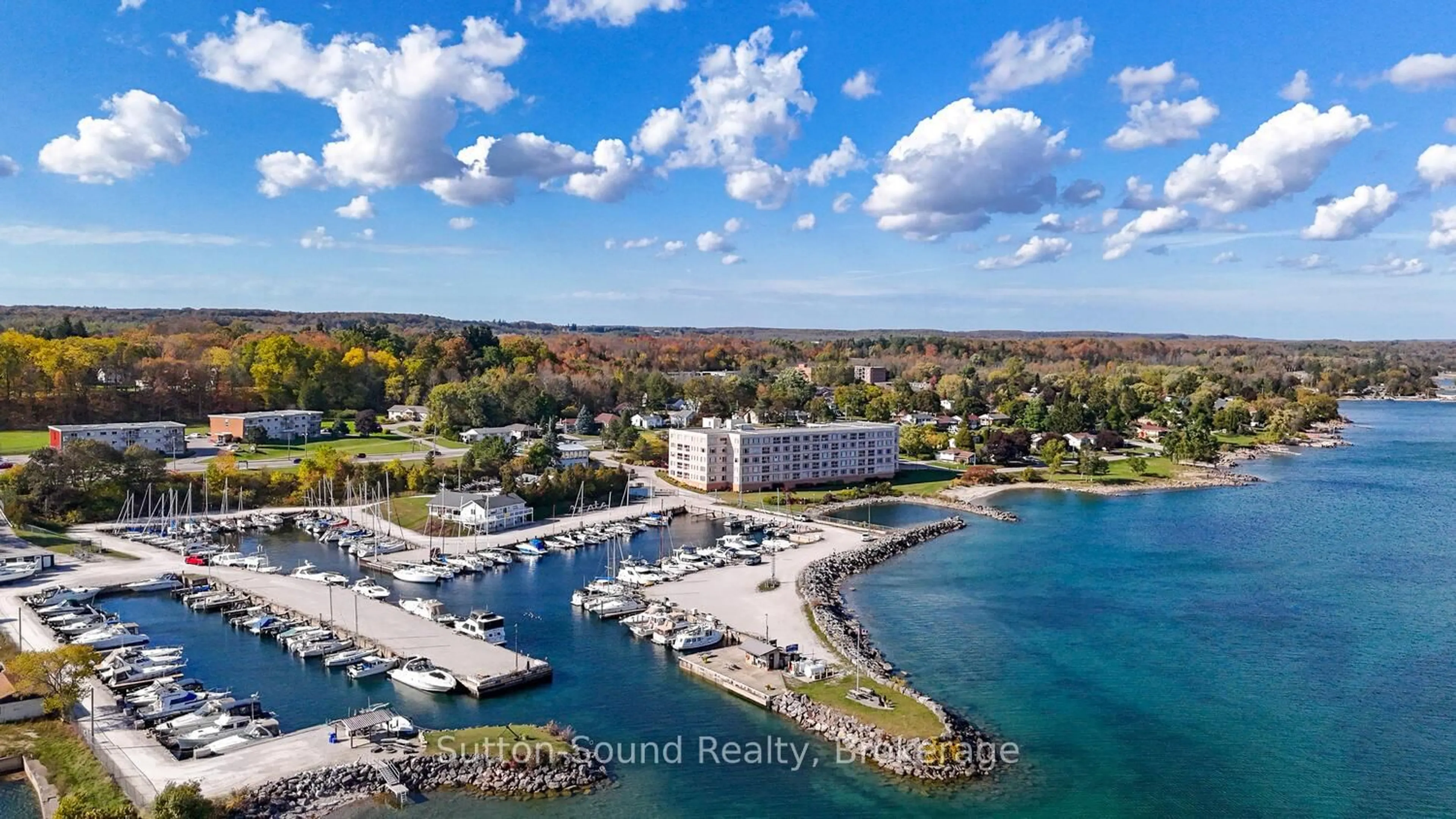 A pic from outside/outdoor area/front of a property/back of a property/a pic from drone, water/lake/river/ocean view for 2555 3rd Ave #315, Owen Sound Ontario N4K 6T8