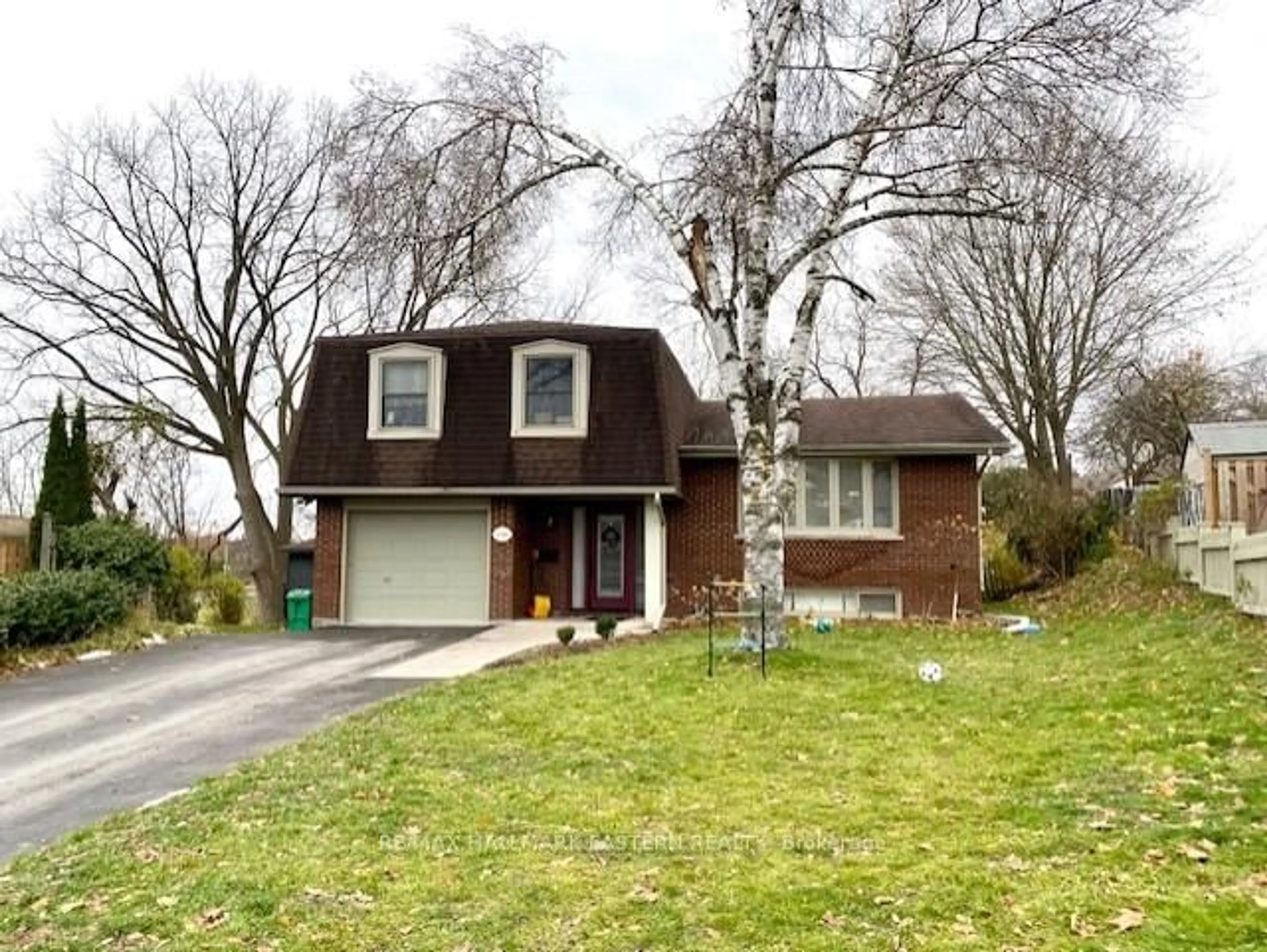 Home with brick exterior material, street for 1186 Cartier Blvd, Peterborough Ontario K9H 6S1