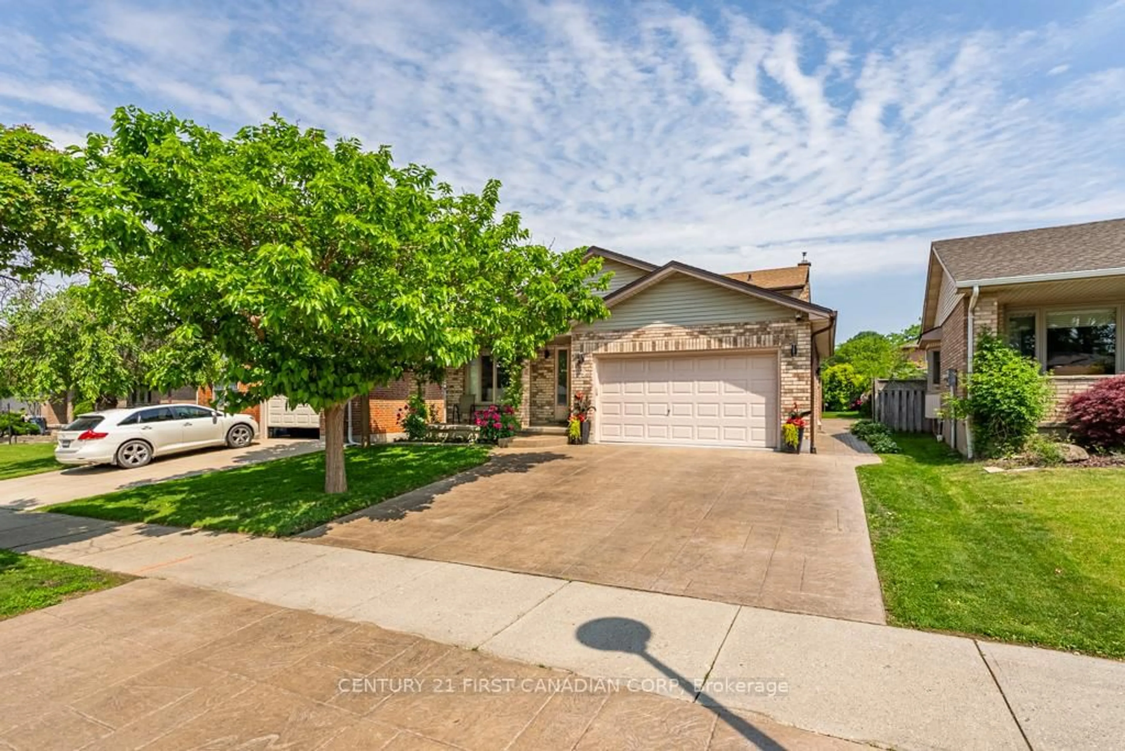 A pic from outside/outdoor area/front of a property/back of a property/a pic from drone, street for 169 Ashley Cres, London South Ontario N6E 3P9