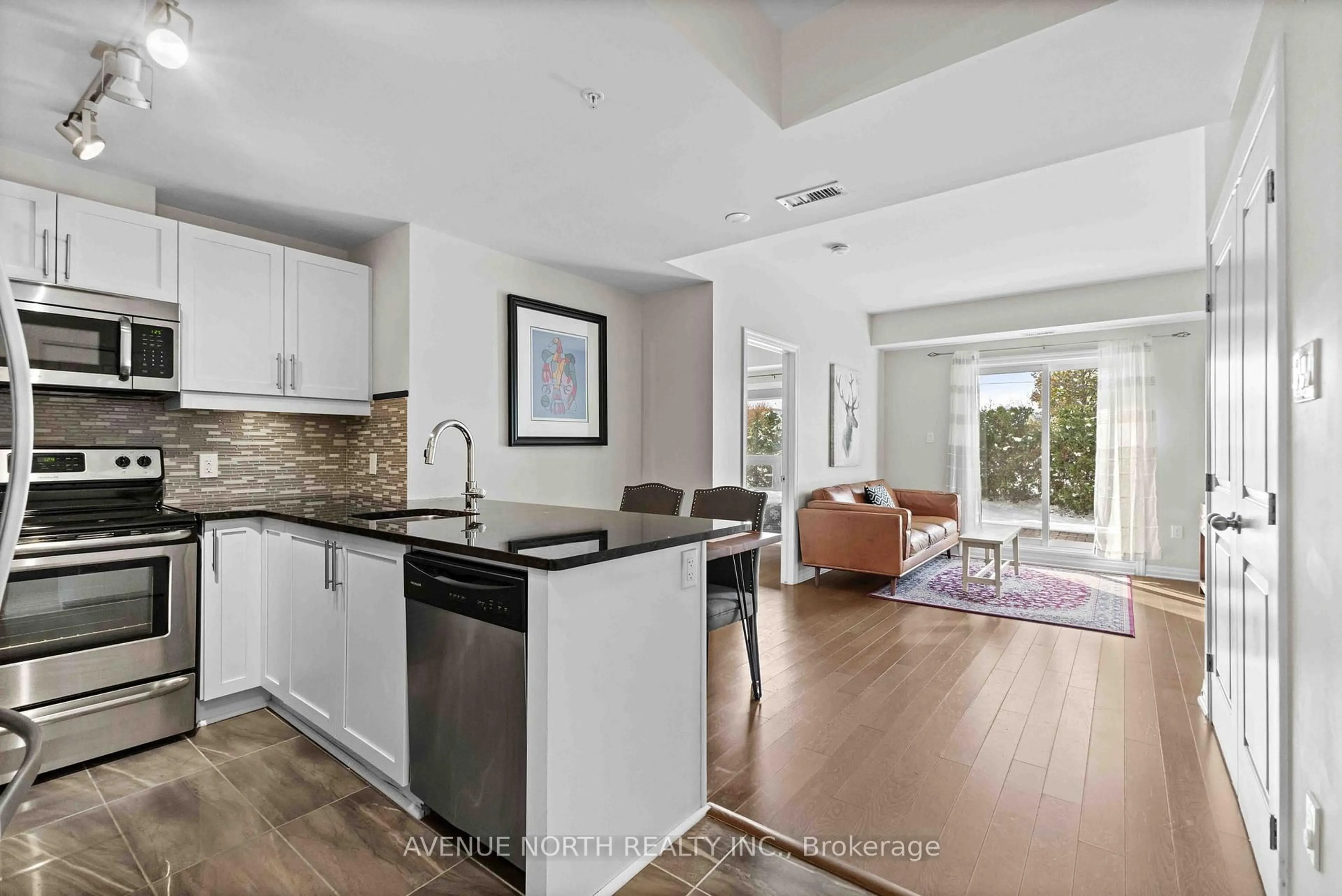 Open concept kitchen, ceramic/tile floor for 200 Winterfell Private #104, Ottawa Ontario K1G 4G1